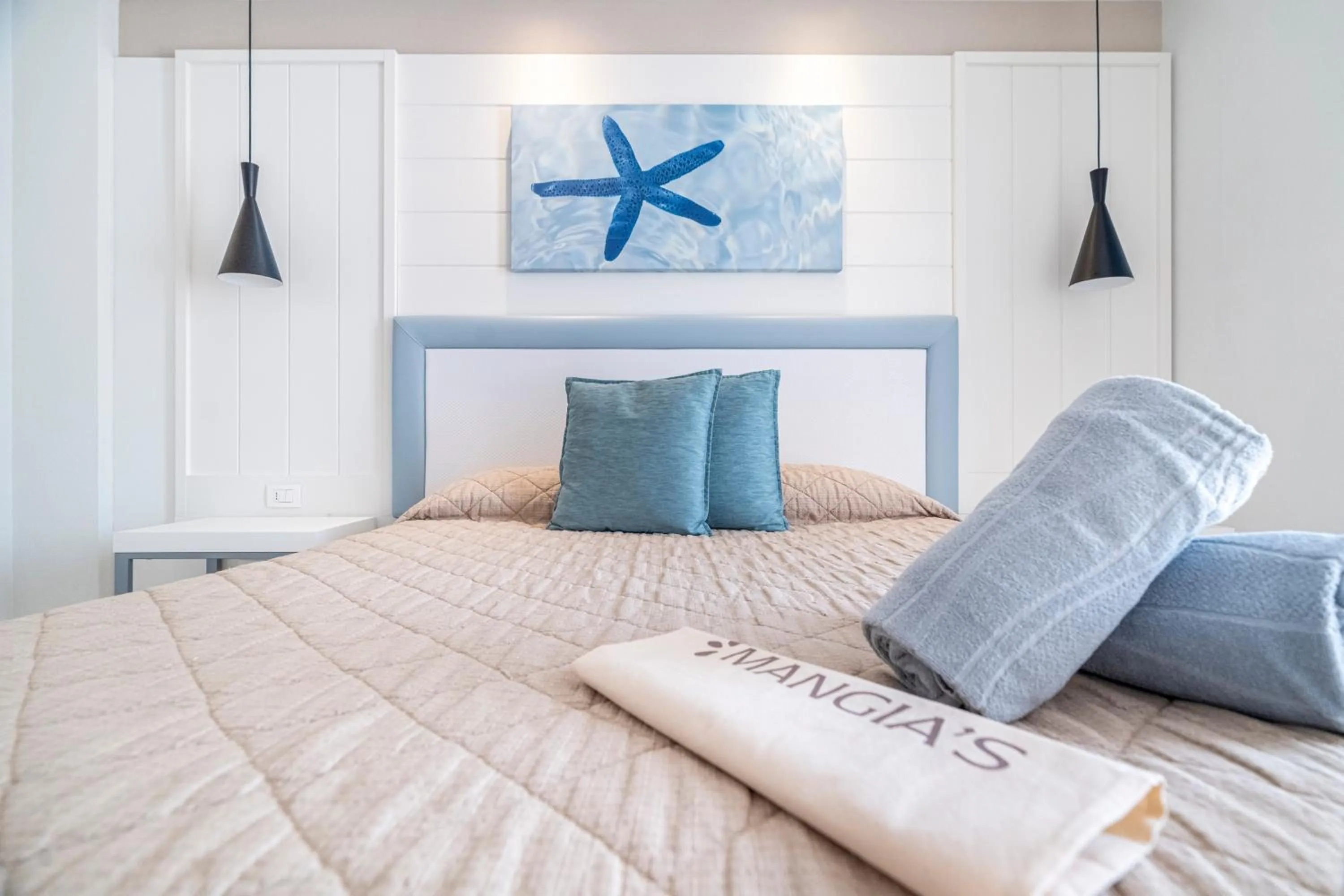 Bed in Mangia's Pollina Resort