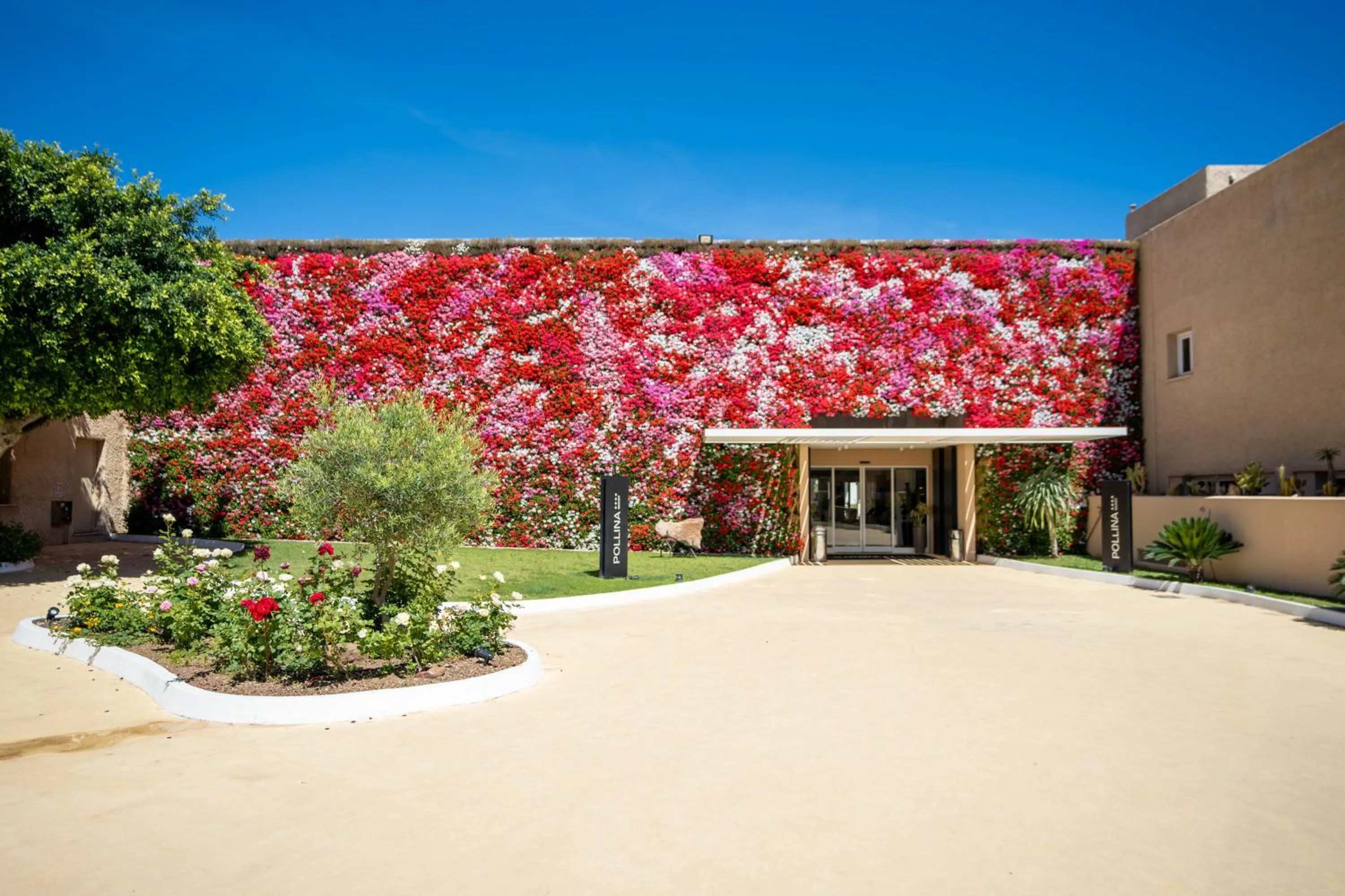 Property building in Mangia's Pollina Resort