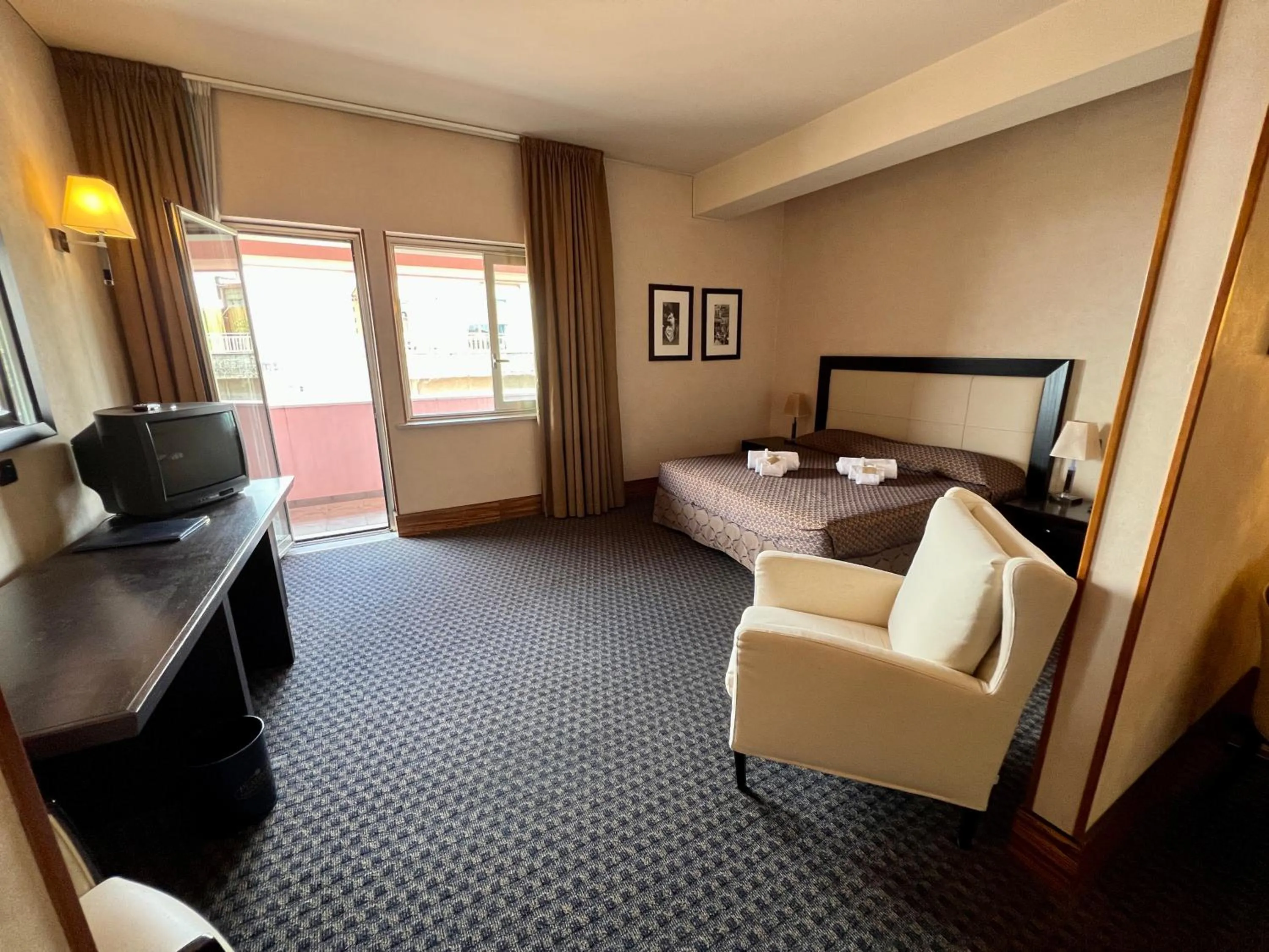 Photo of the whole room, Bed in Hotel La Fenice