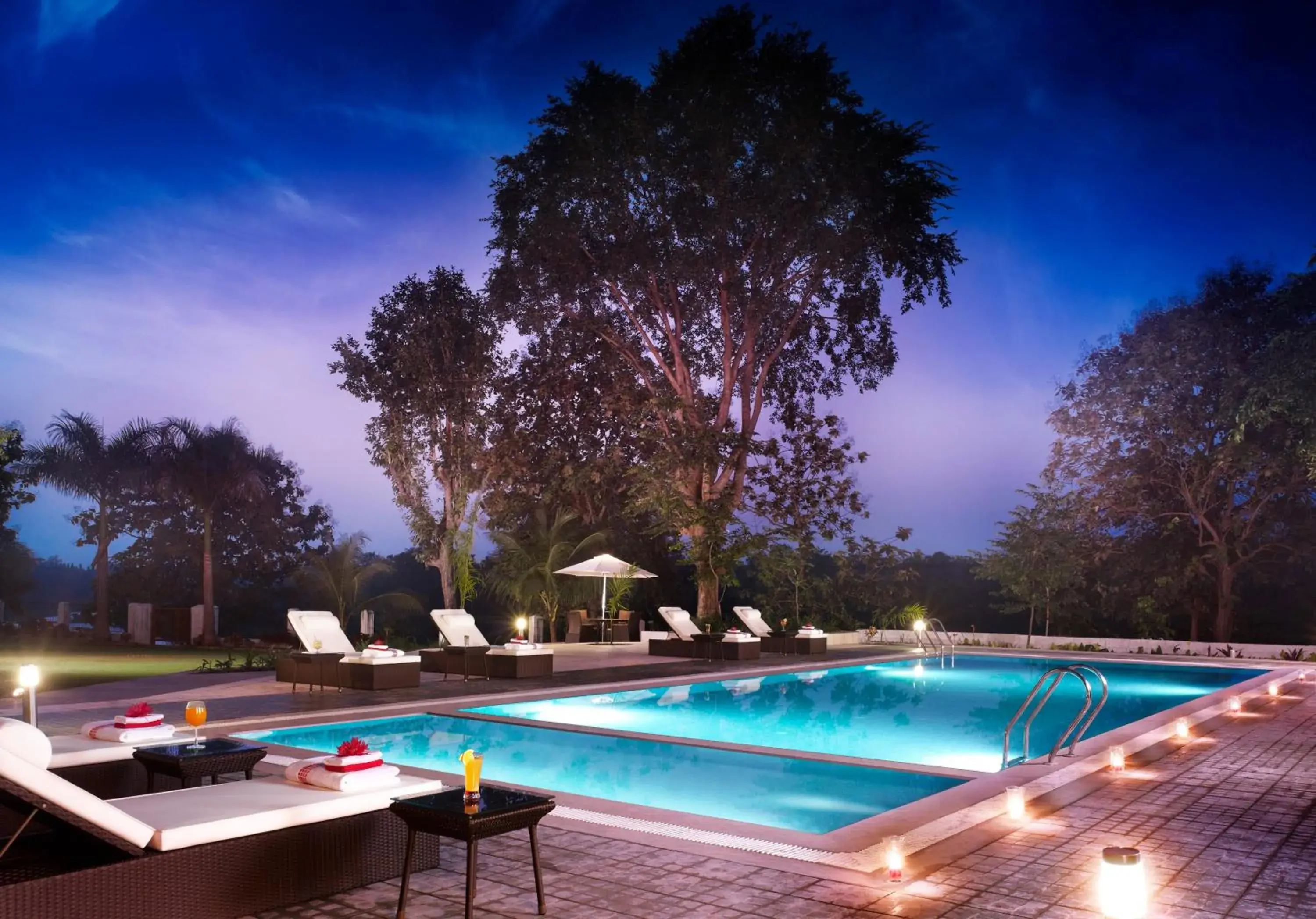 Swimming pool in Gir Serai - IHCL SeleQtions Swimming pool in Gir Serai - IHCL SeleQtions