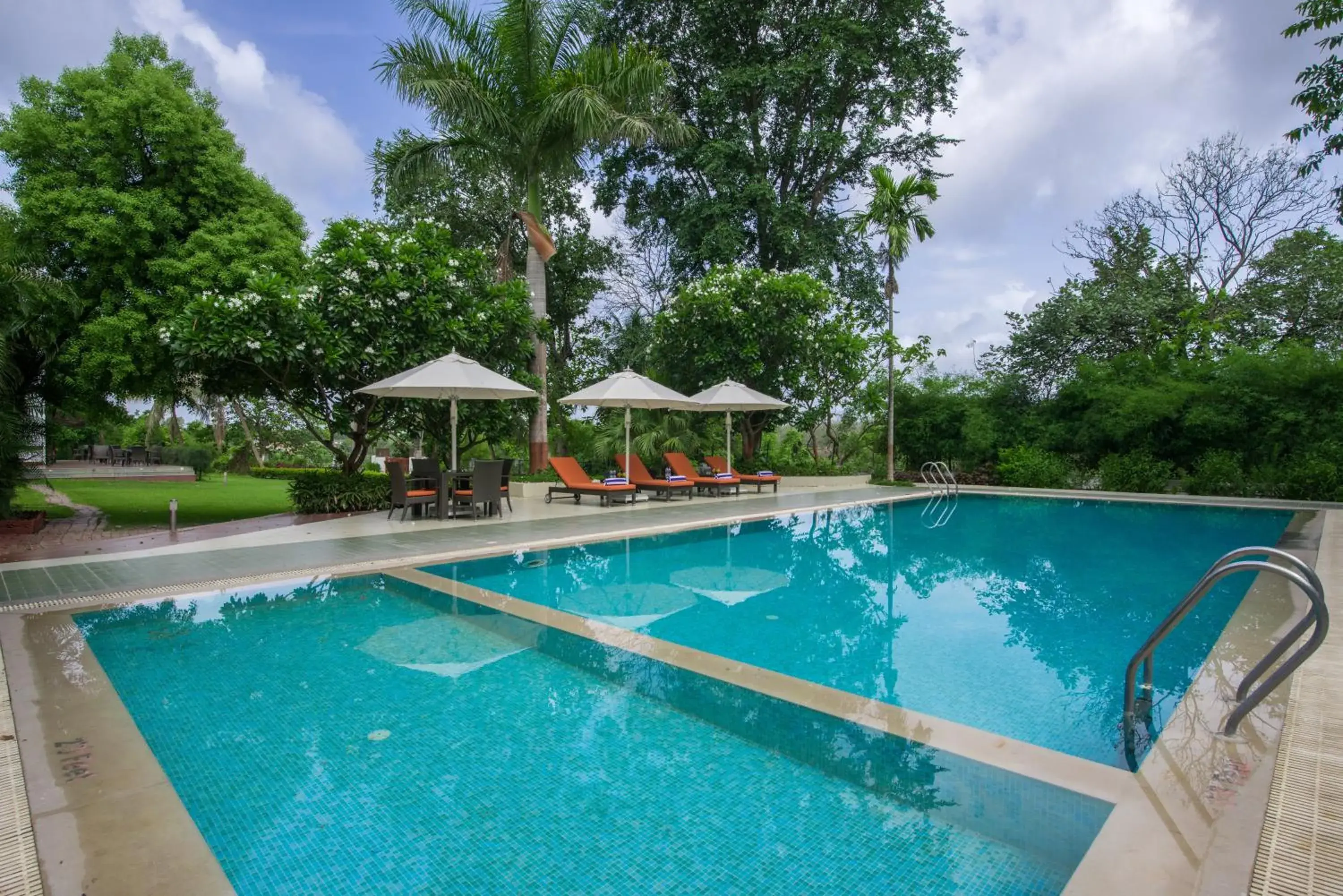 Swimming pool in Gir Serai - IHCL SeleQtions Swimming pool in Gir Serai - IHCL SeleQtions