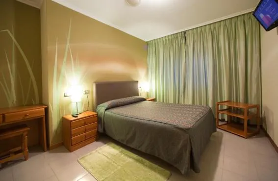 Photo of the whole room, Bed in Hostal Restaurante Terra Chá