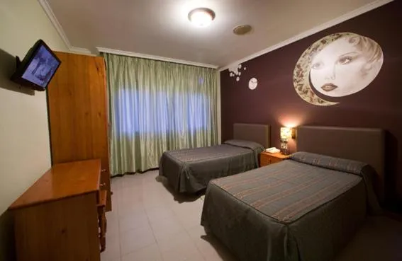 Photo of the whole room, Bed in Hostal Restaurante Terra Chá