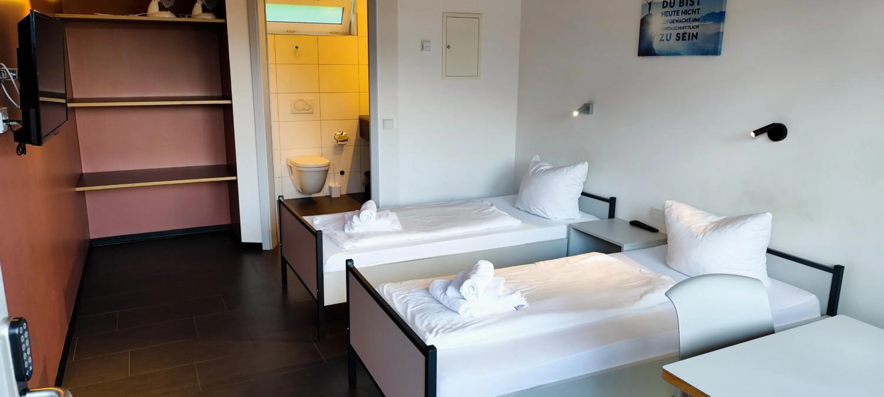 Photo of the whole room, Bed in Arena Hotel Waldshut