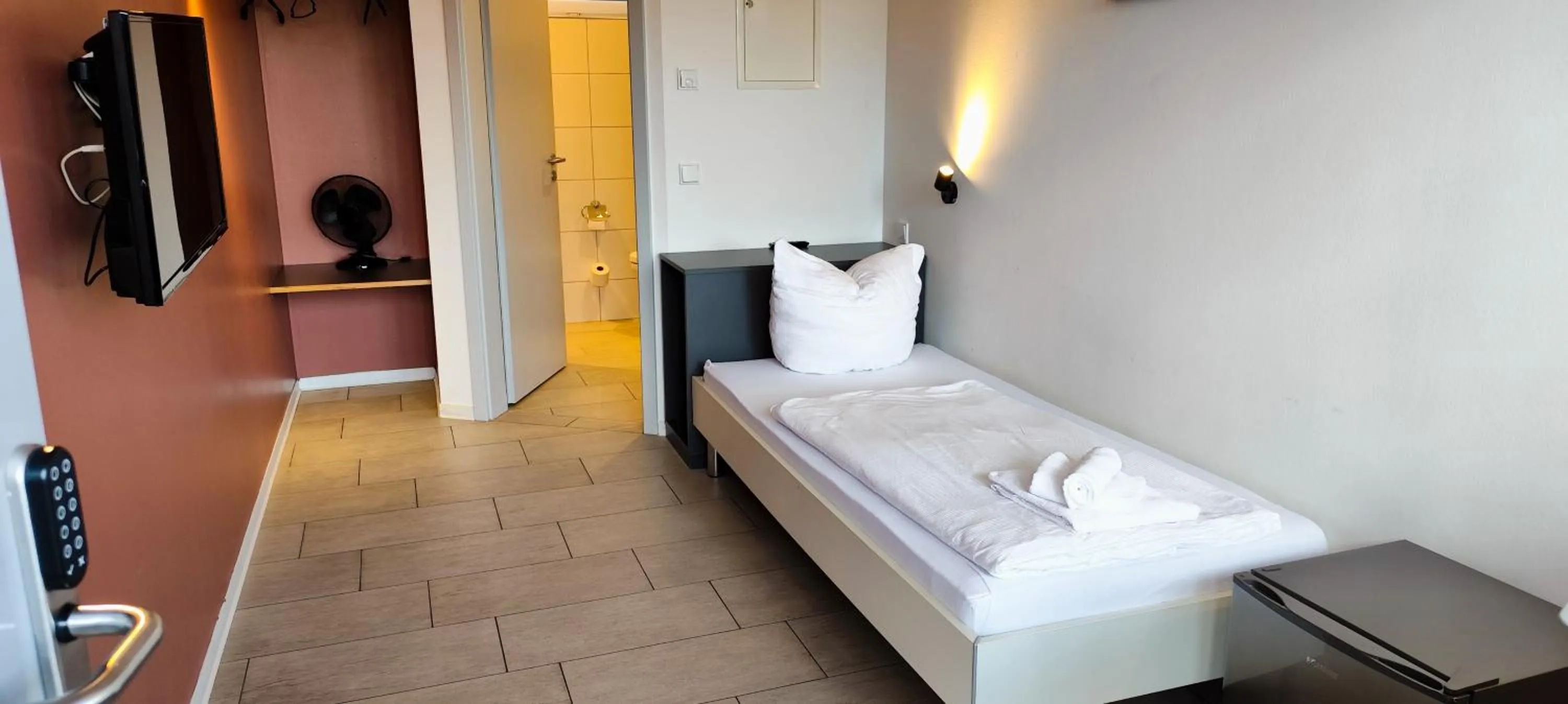 Photo of the whole room, Bed in Arena Hotel Waldshut