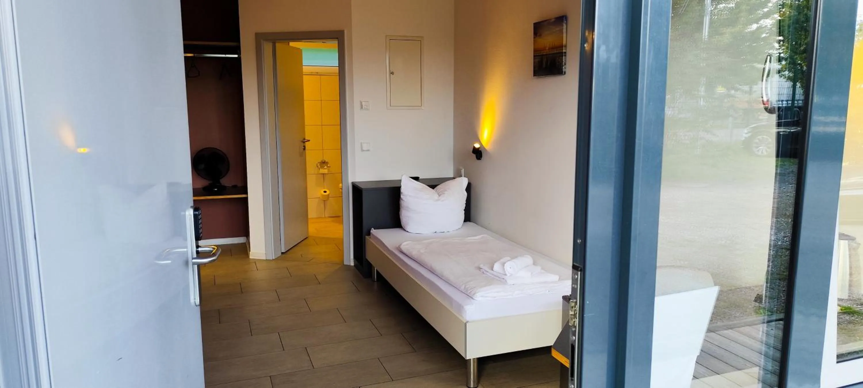 Photo of the whole room, Bed in Arena Hotel Waldshut