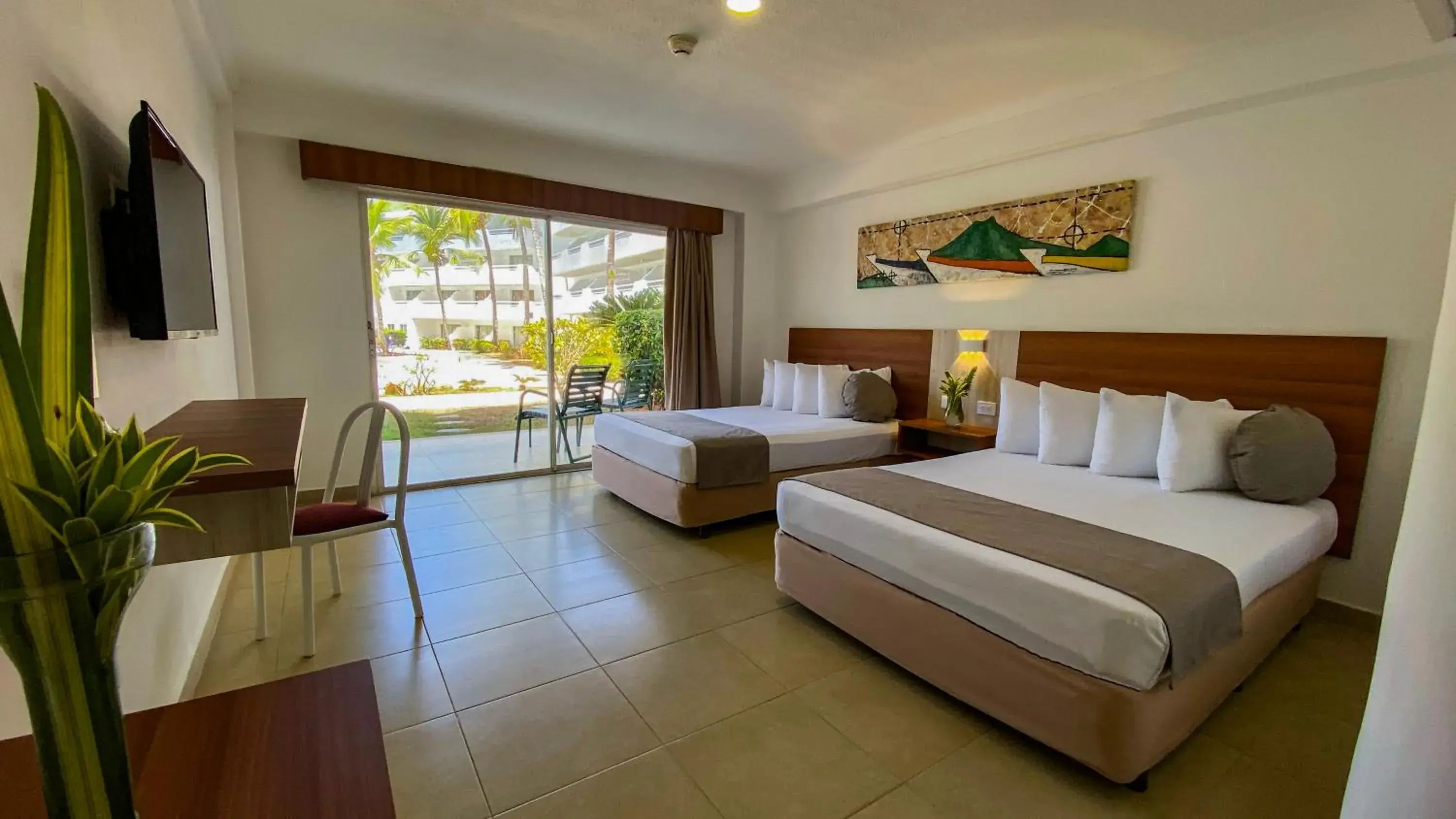 Photo of the whole room, Bed in Sunsol Isla Caribe Photo of the whole room, Bed in Sunsol Isla Caribe