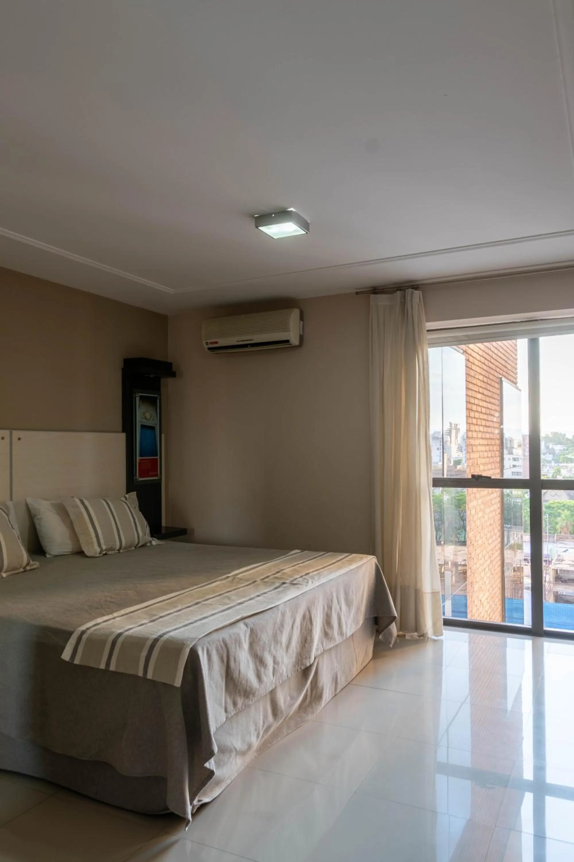 Bed in Sol de Piedra Apart, Suites & Spa