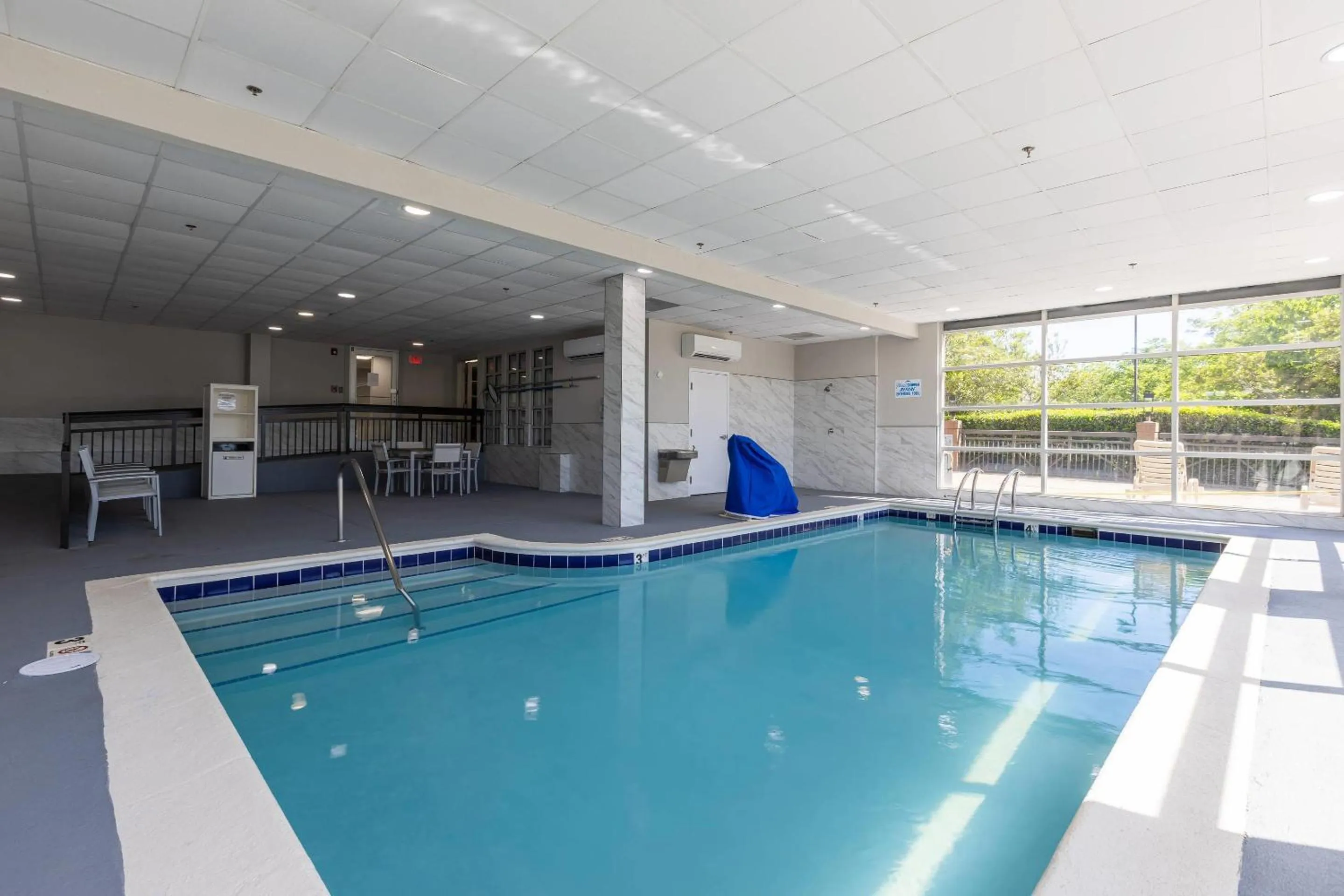 Swimming pool in Country Inn & Suites by Radisson, Lake Norman Huntersville, NC