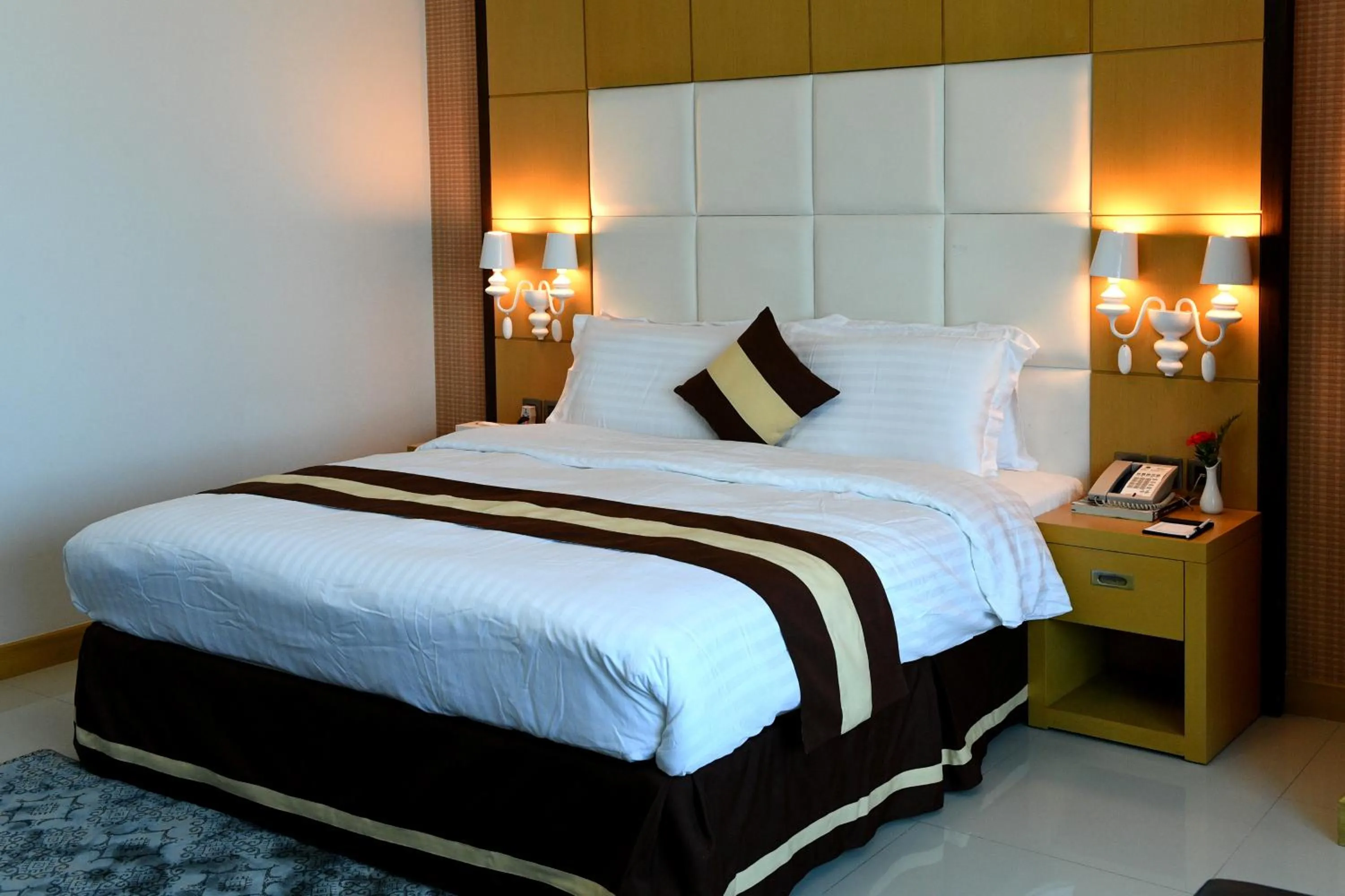 Bed in Al Olaya Suites Hotel