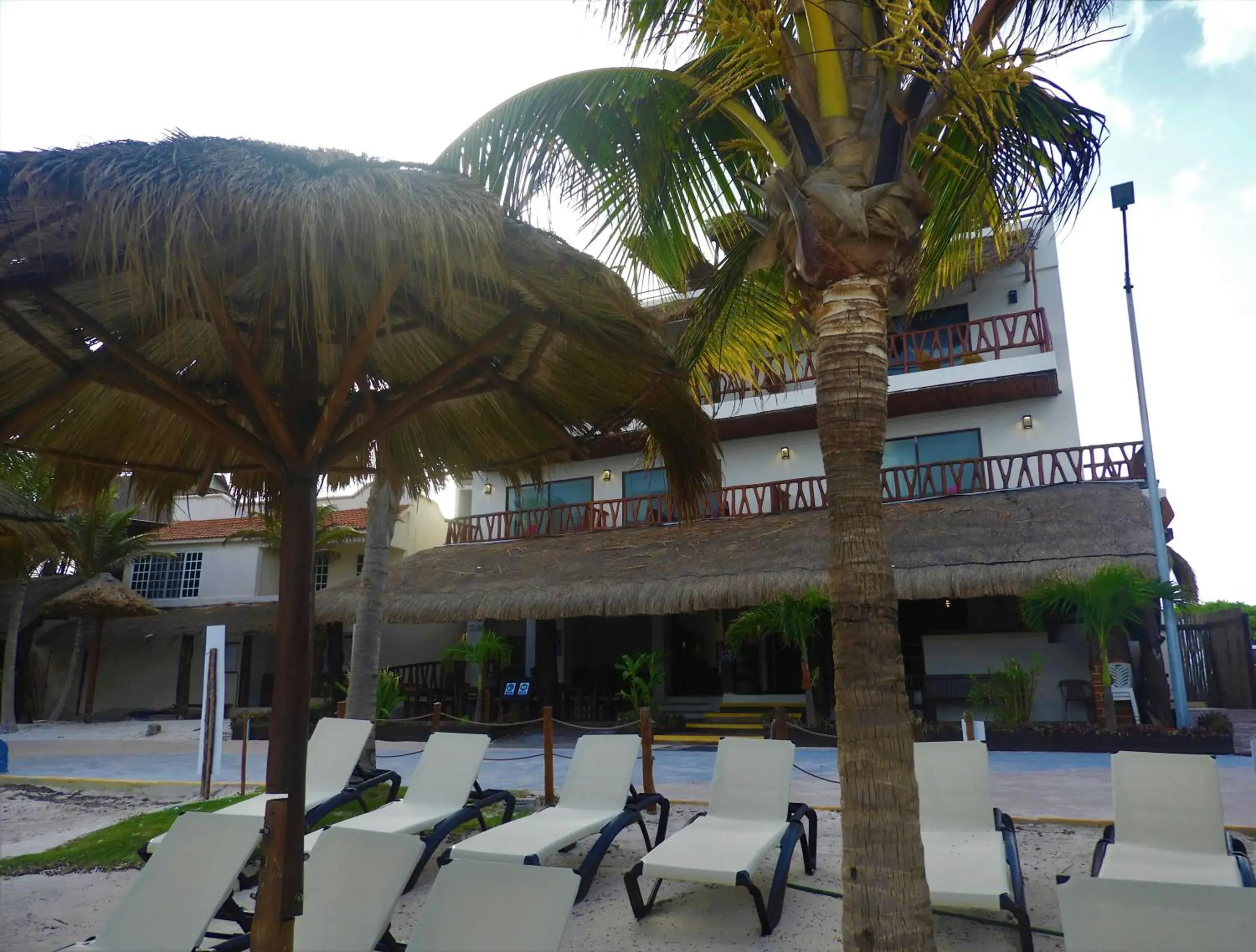 Property building in Quinto Sole Boutique Hotel Mahahual Property building in Quinto Sole Boutique Hotel Mahahual