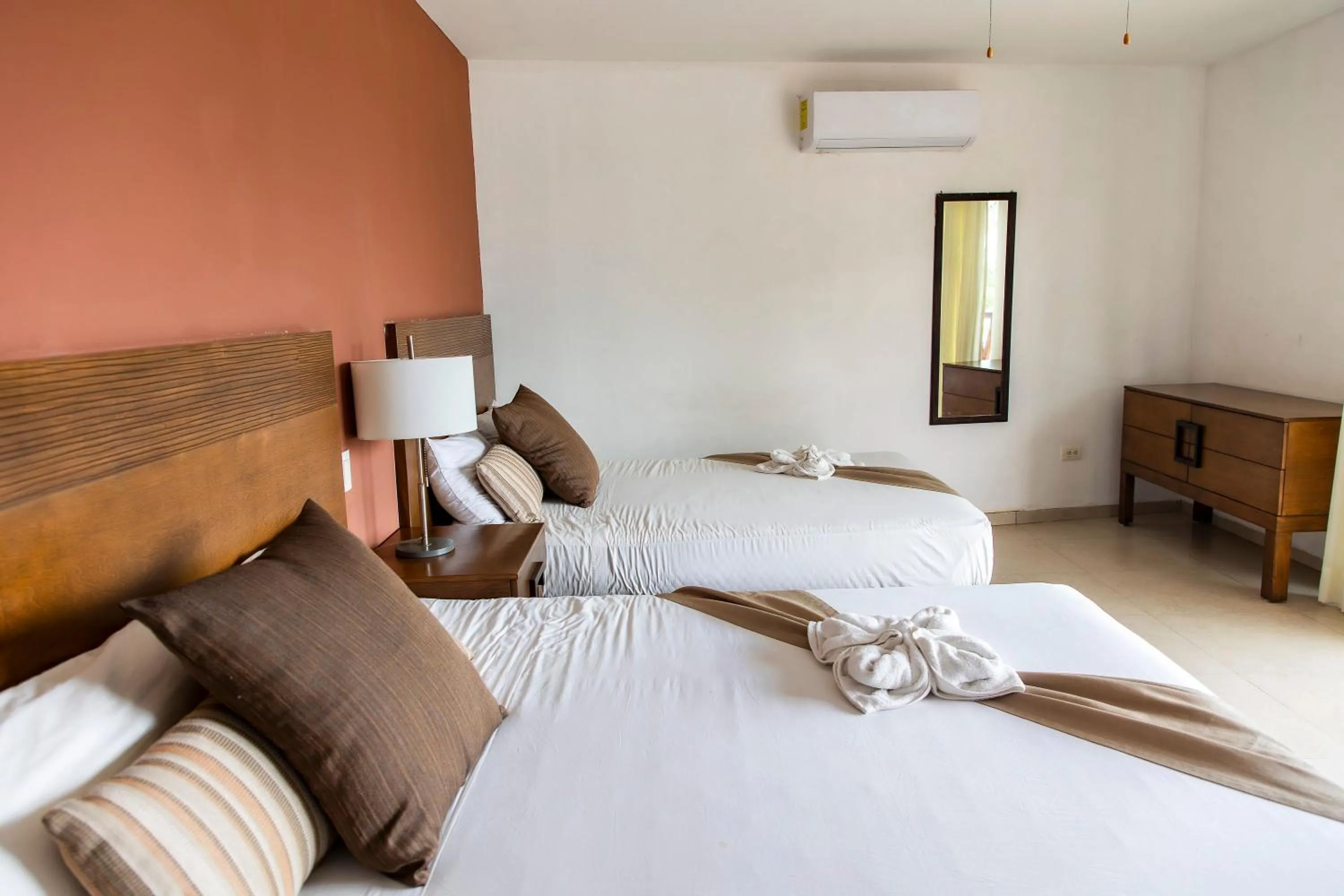 Bed in Quinto Sole Boutique Hotel Mahahual