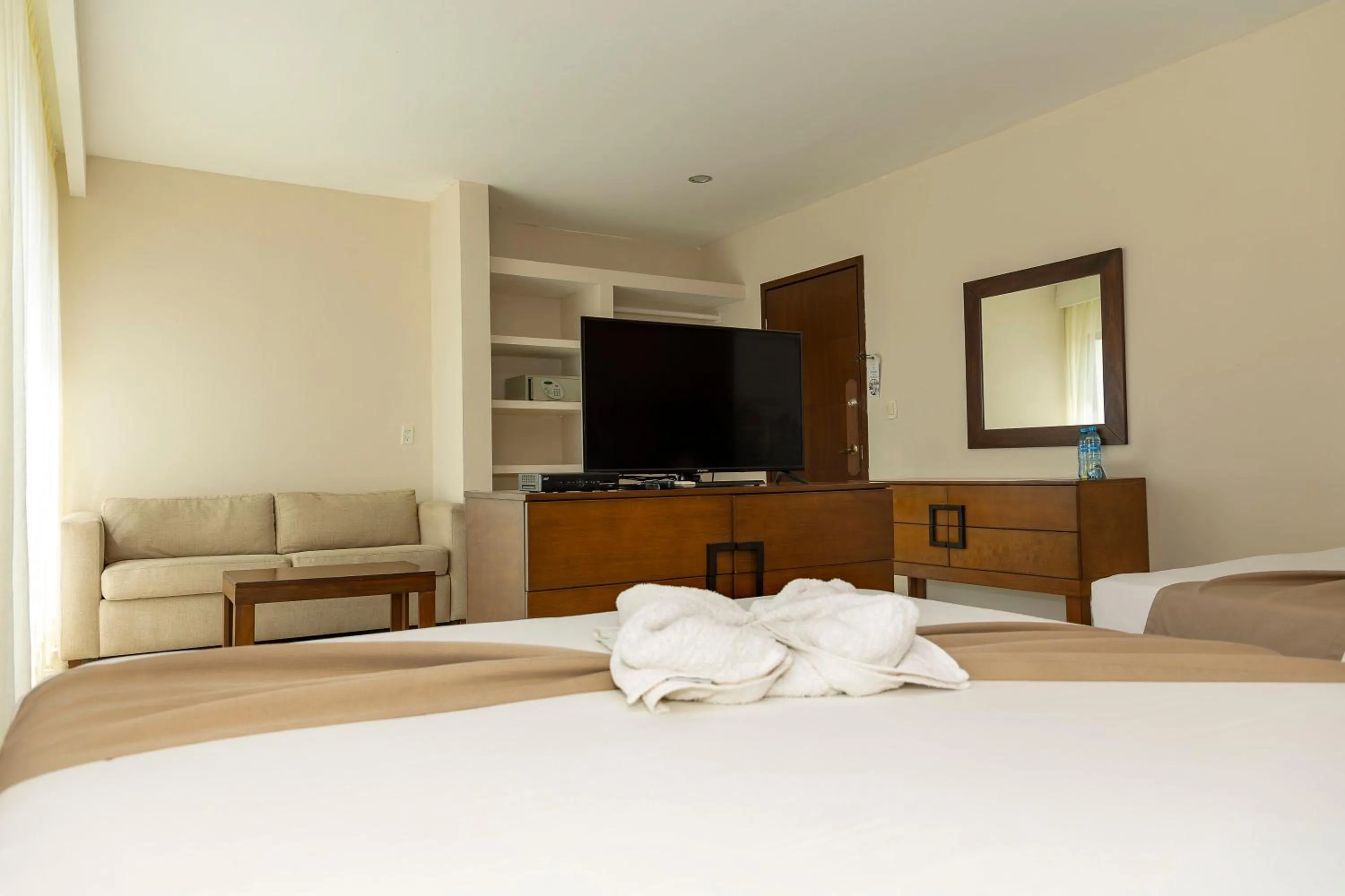 Bed in Quinto Sole Boutique Hotel Mahahual