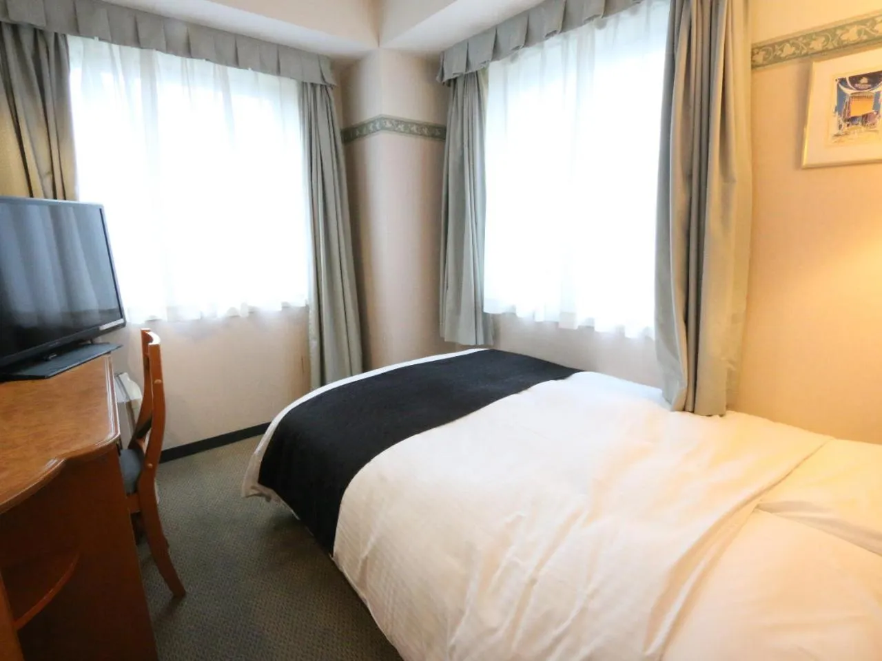 Photo of the whole room, Bed in APA Hotel Fukui Katamachi