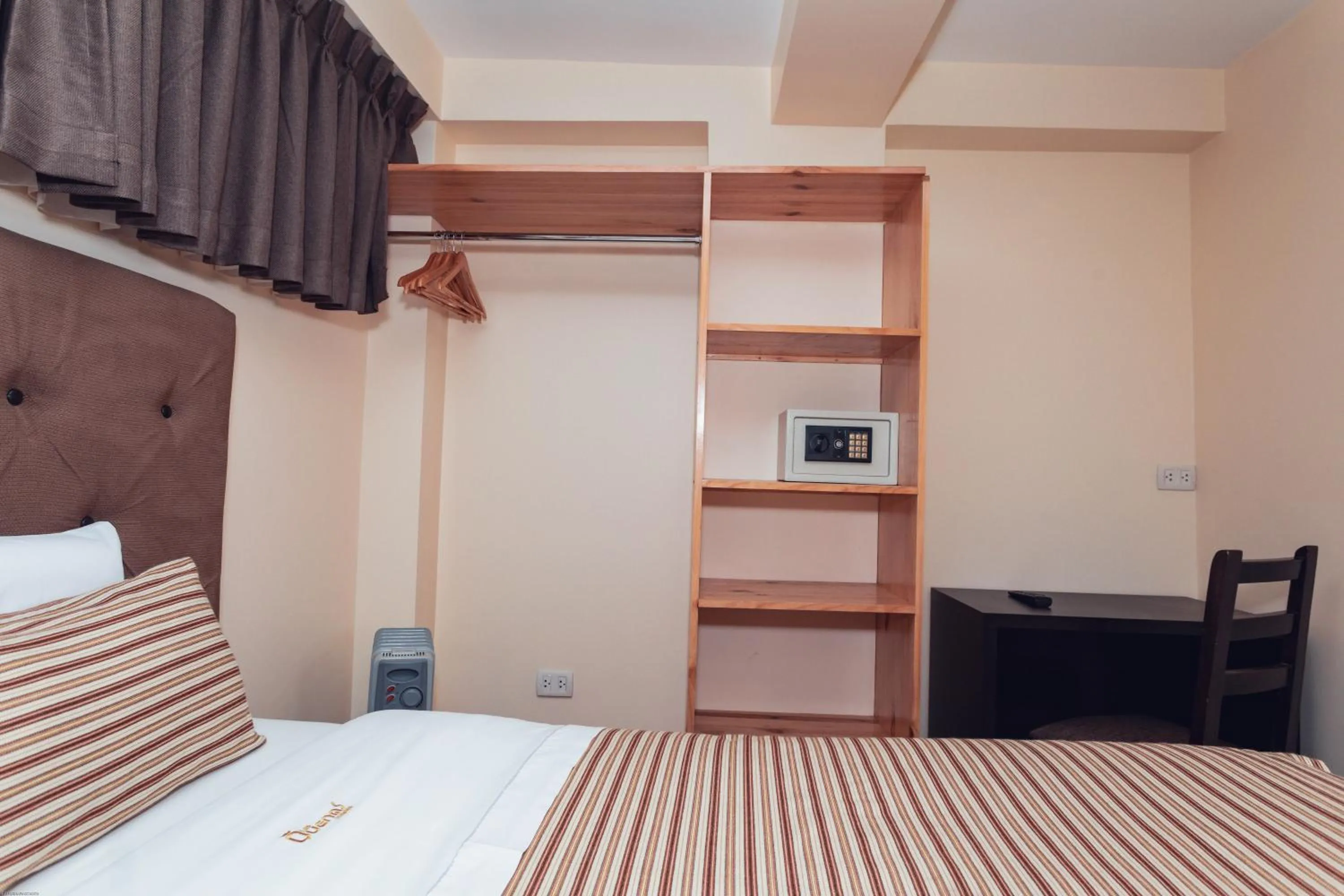 Bed in Hotel Las Quenas