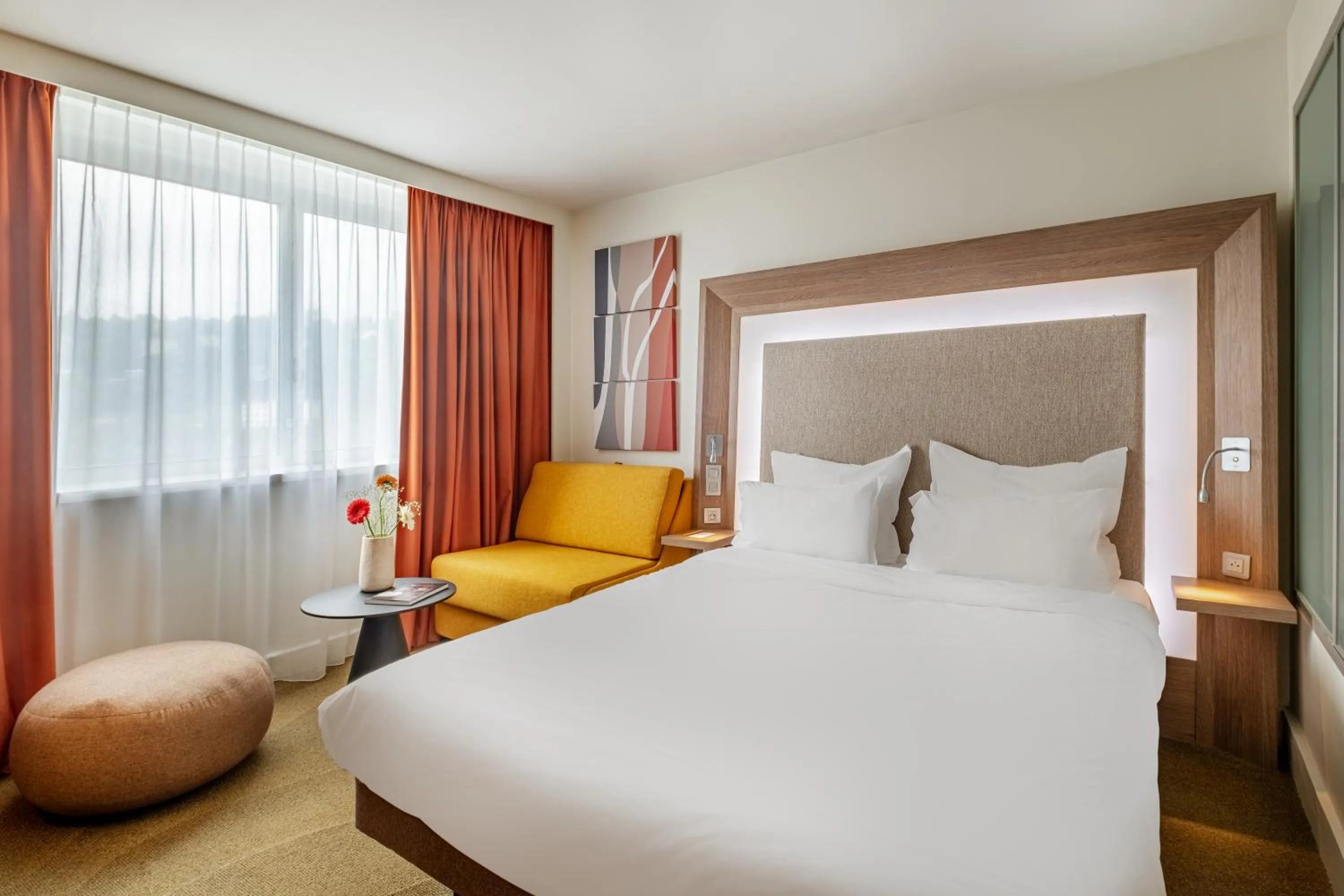 Photo of the whole room, Bed in Novotel Lyon Centre-Confluence Bord de Saone