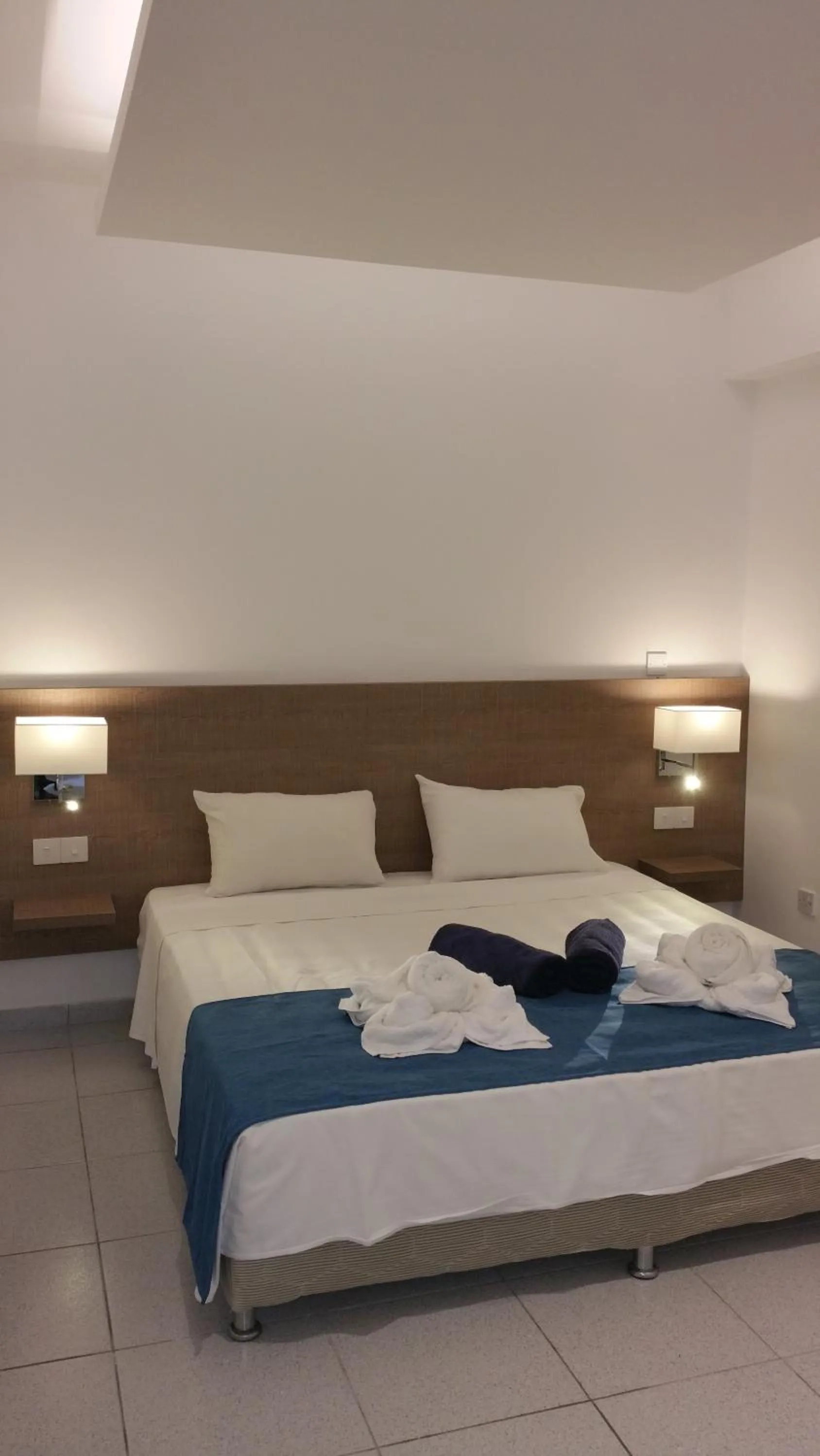 Bed in Marica's Boutique Hotel