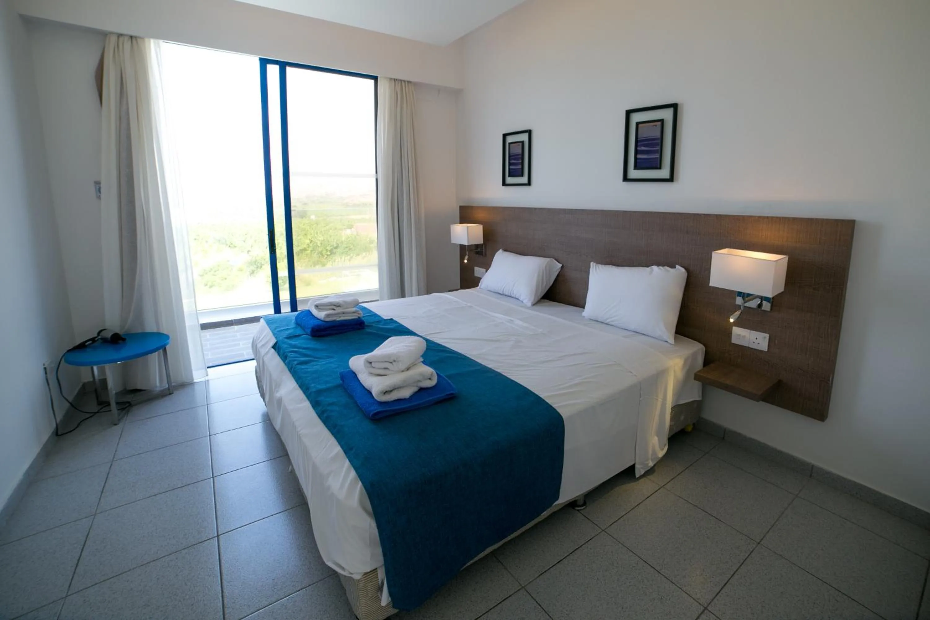 Bed in Marica's Boutique Hotel