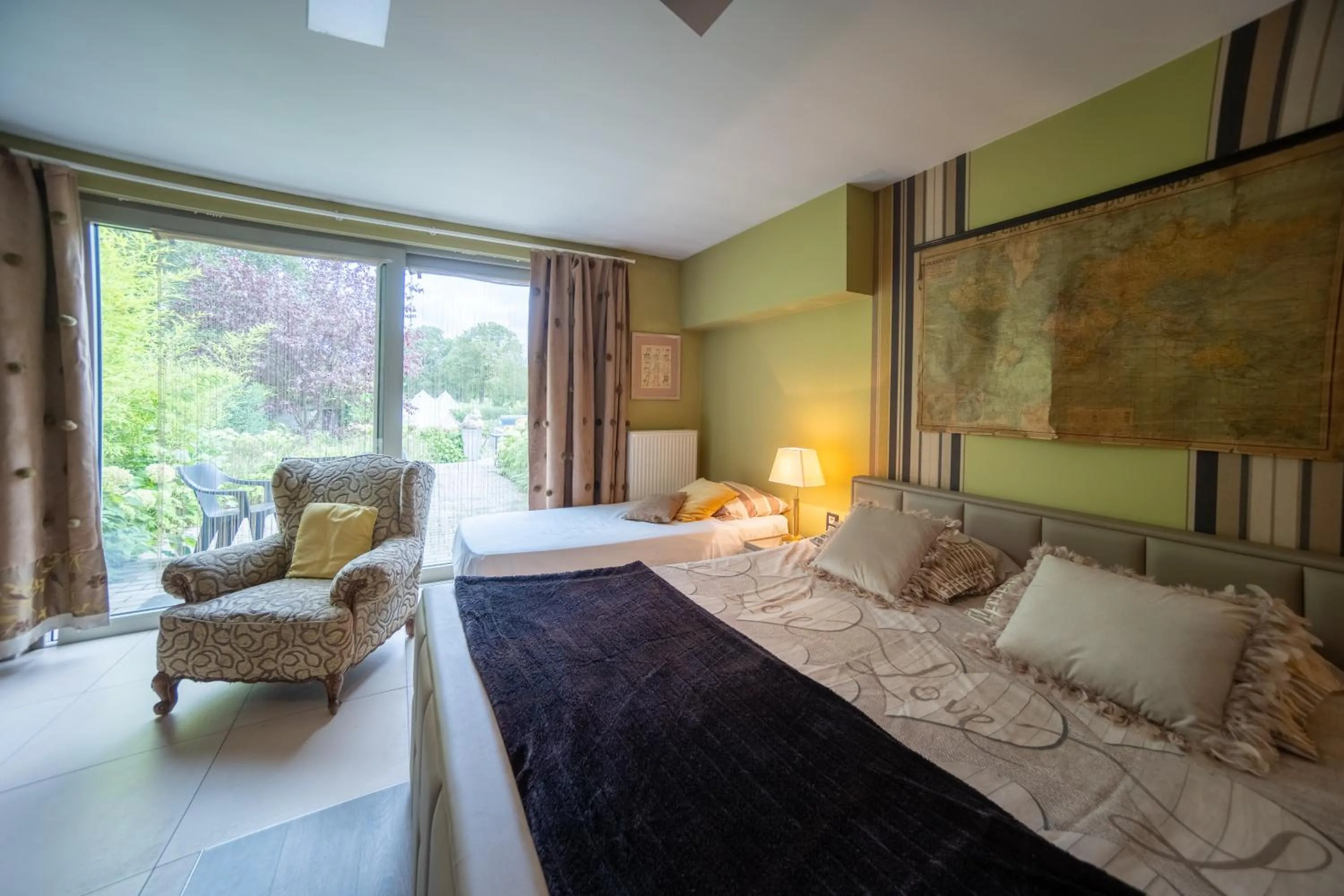 Bed in Guesthouse De Witte Merel Deluxe