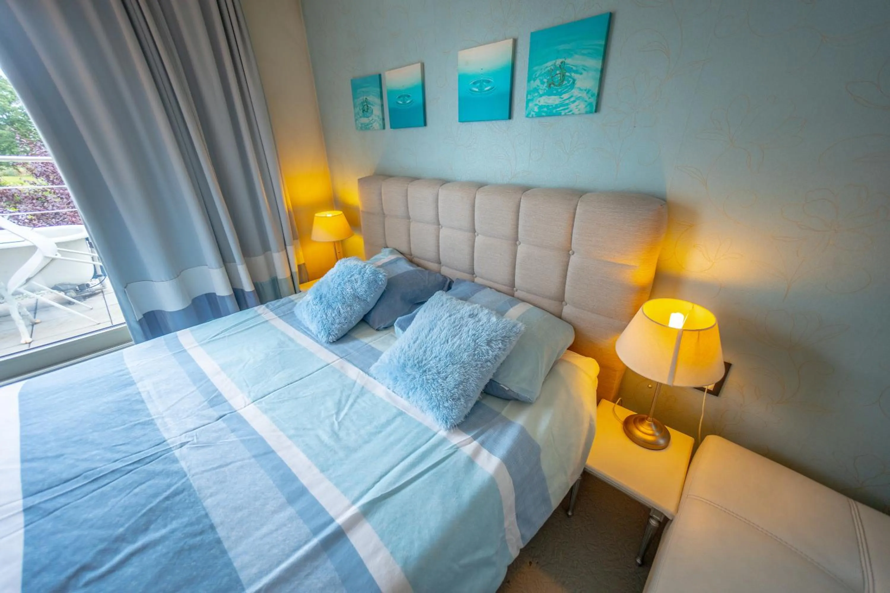 Bed in Guesthouse De Witte Merel Deluxe