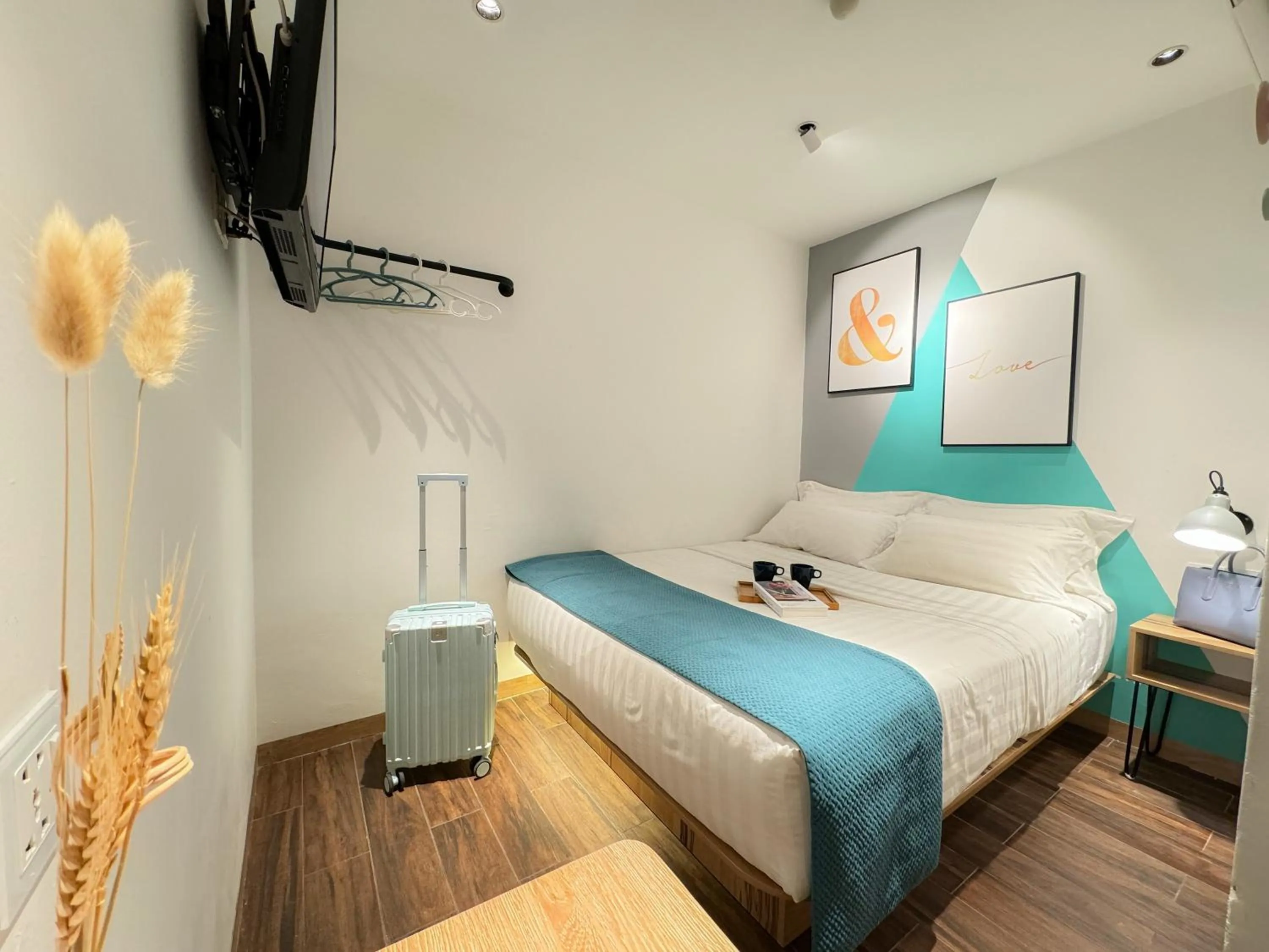 Bed in Apple 1 Hotel Queensbay