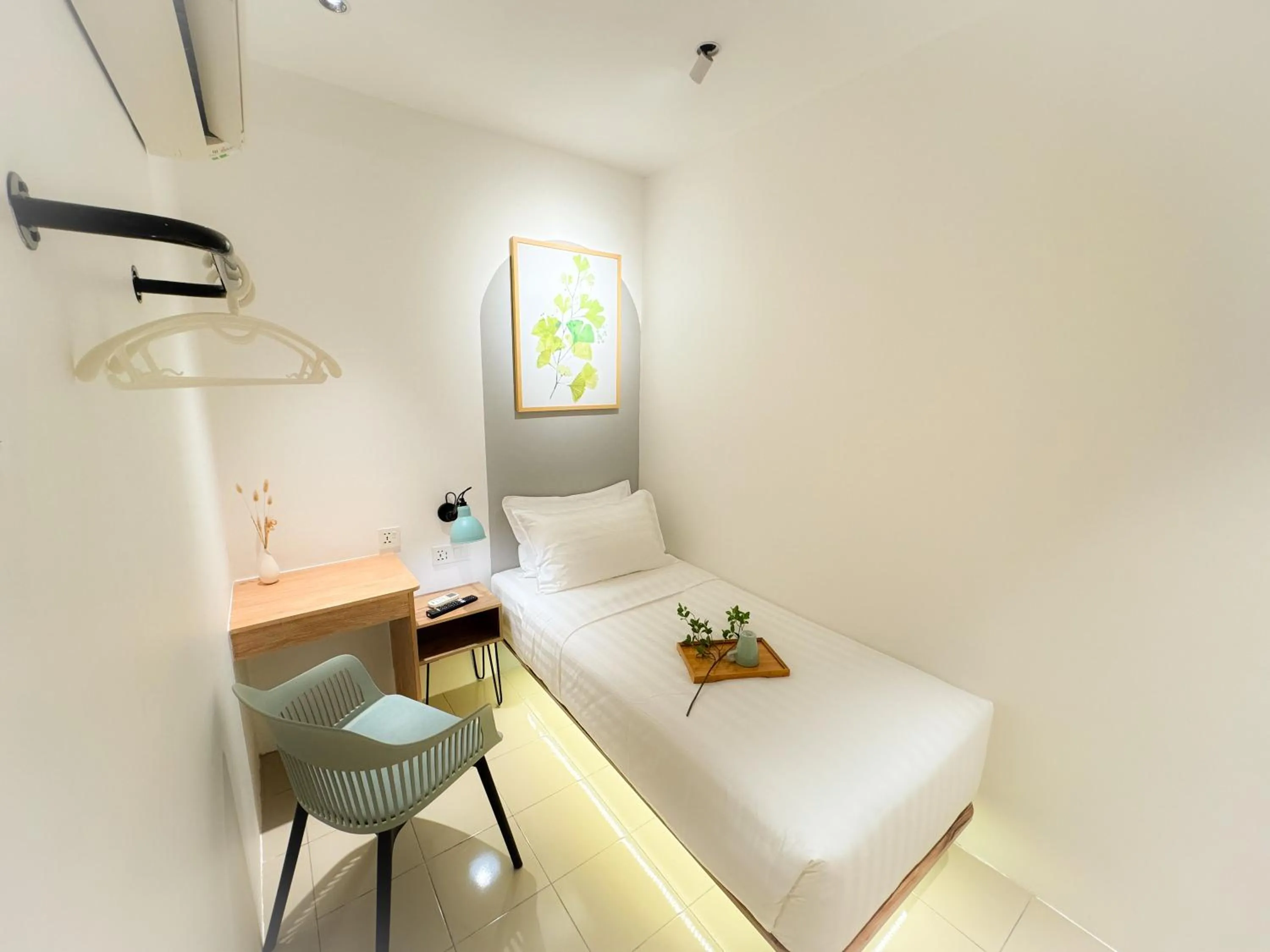 Bed in Apple 1 Hotel Queensbay