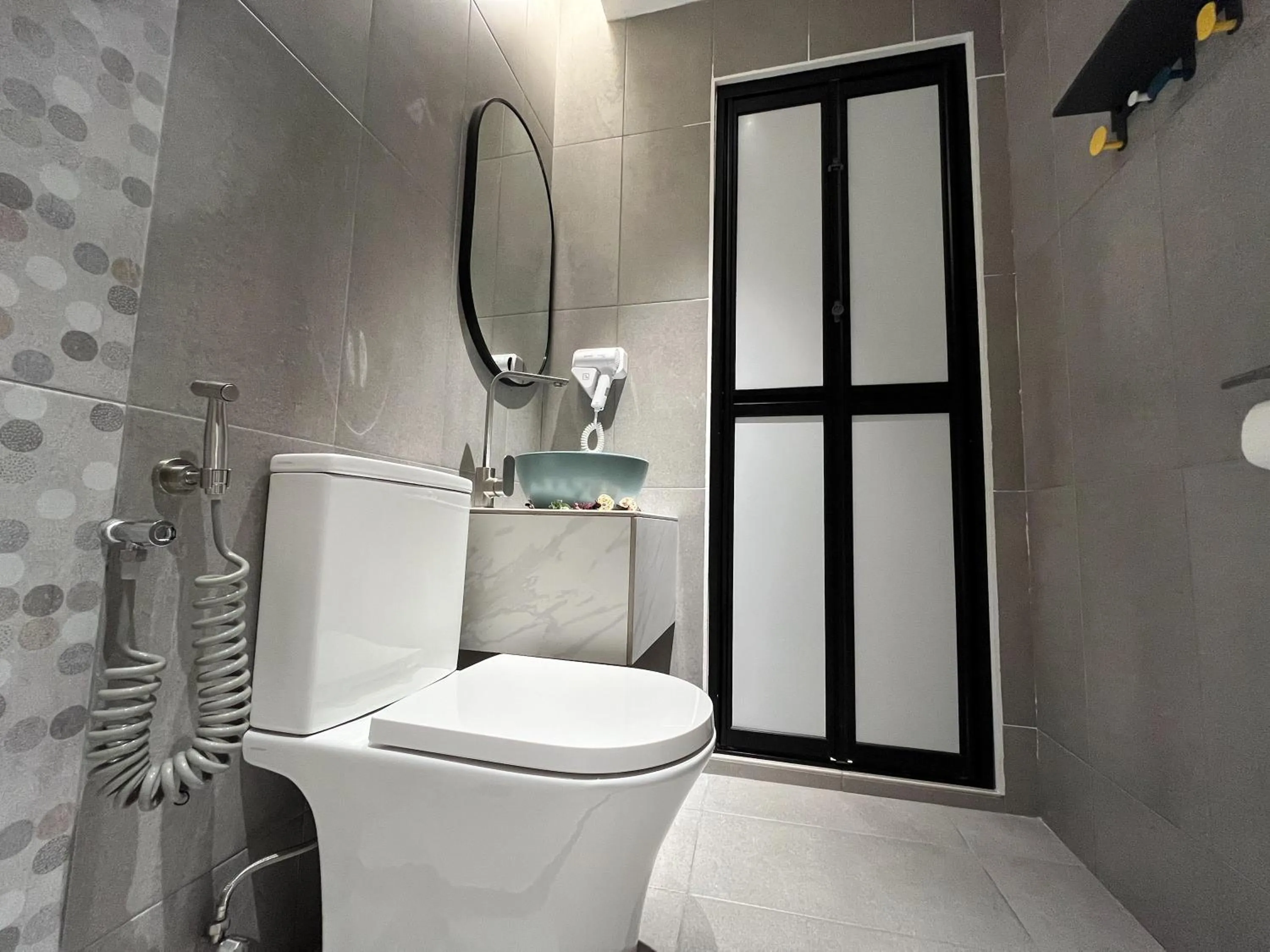 Bathroom in Apple 1 Hotel Queensbay