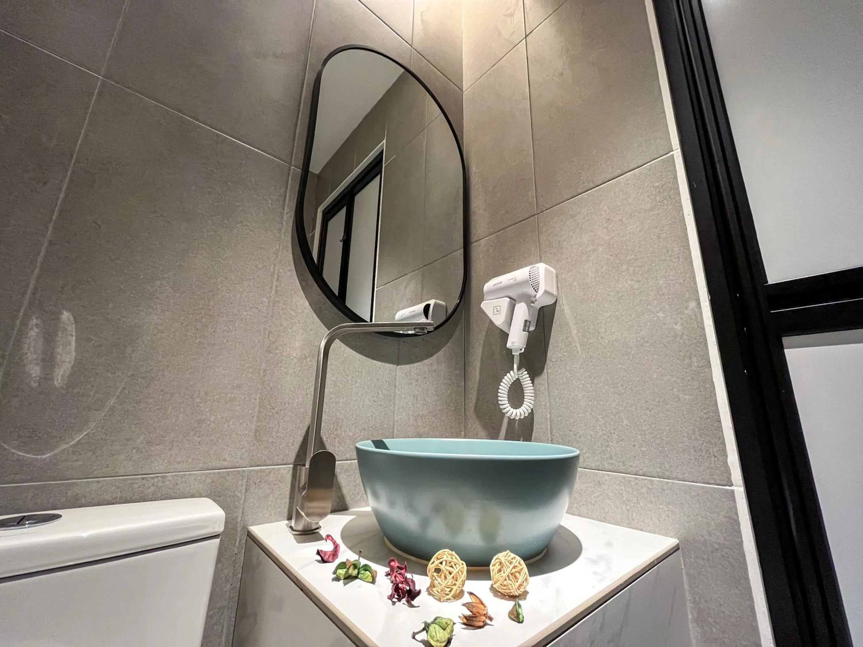 Bathroom in Apple 1 Hotel Queensbay