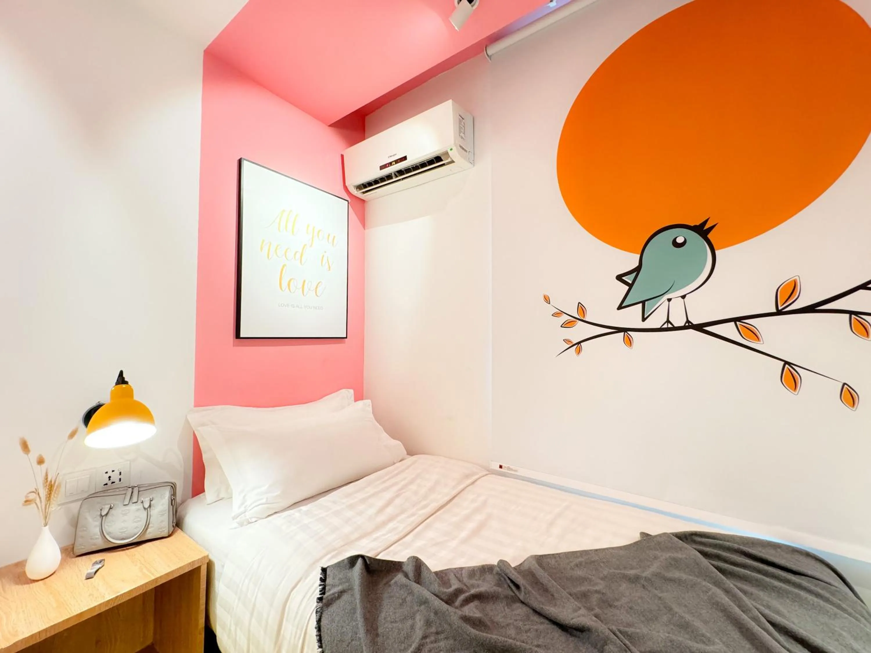 Bed in Apple 1 Hotel Queensbay