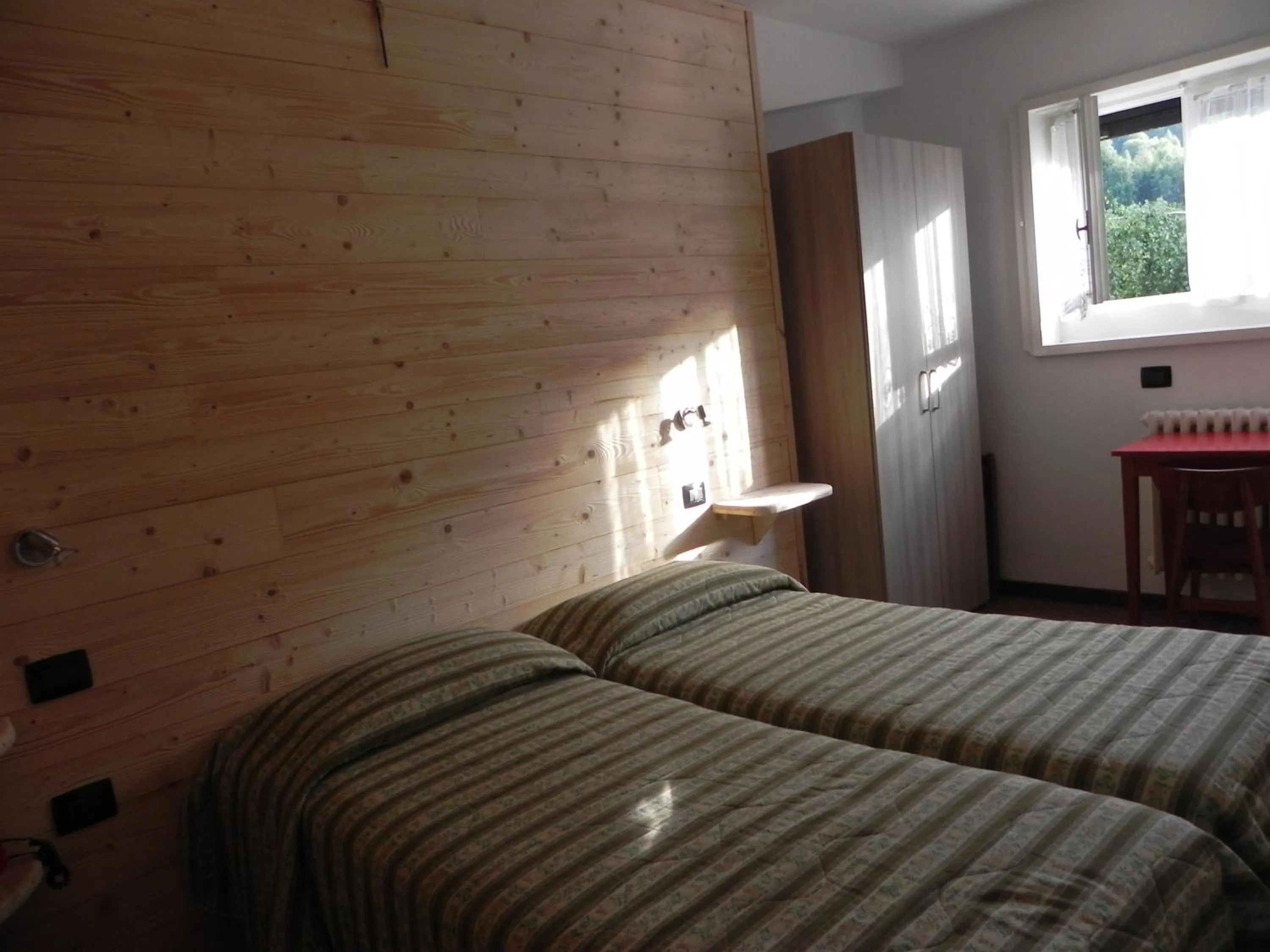 Bed in Albergo Cioccarelli