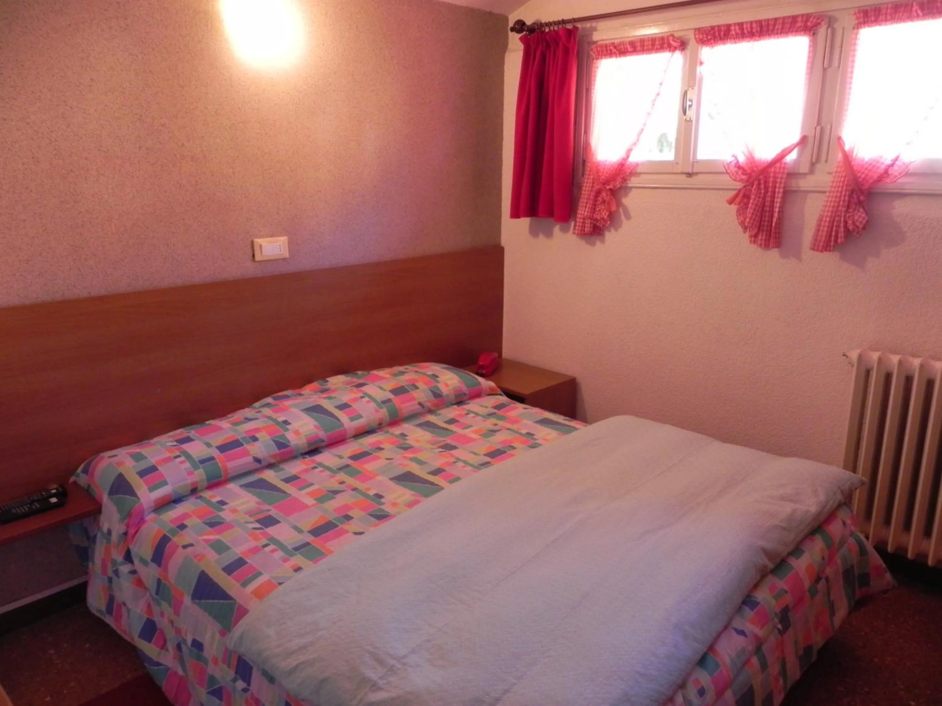 Bed in Albergo Cioccarelli