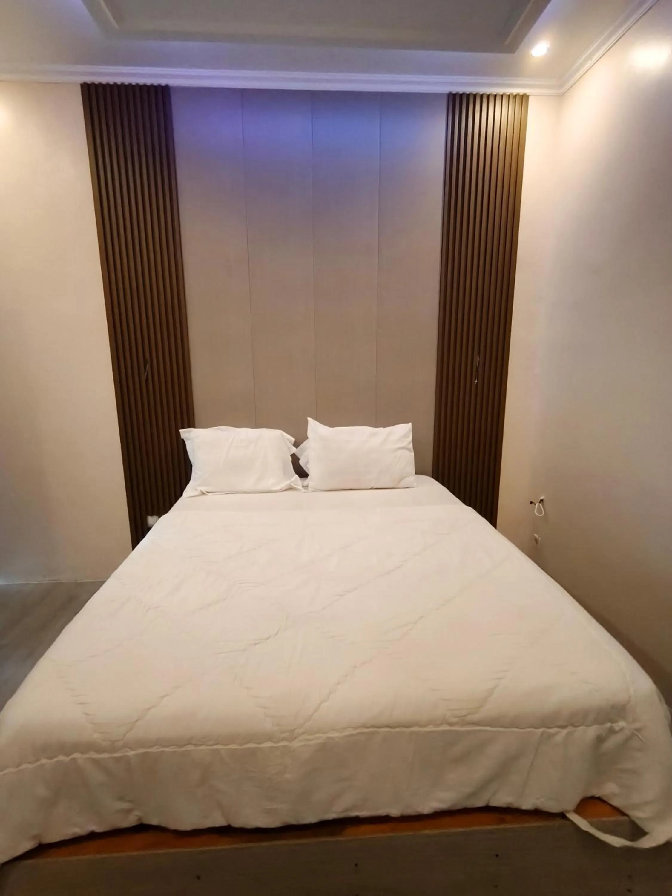 Bed in Bakom Inn Syariah