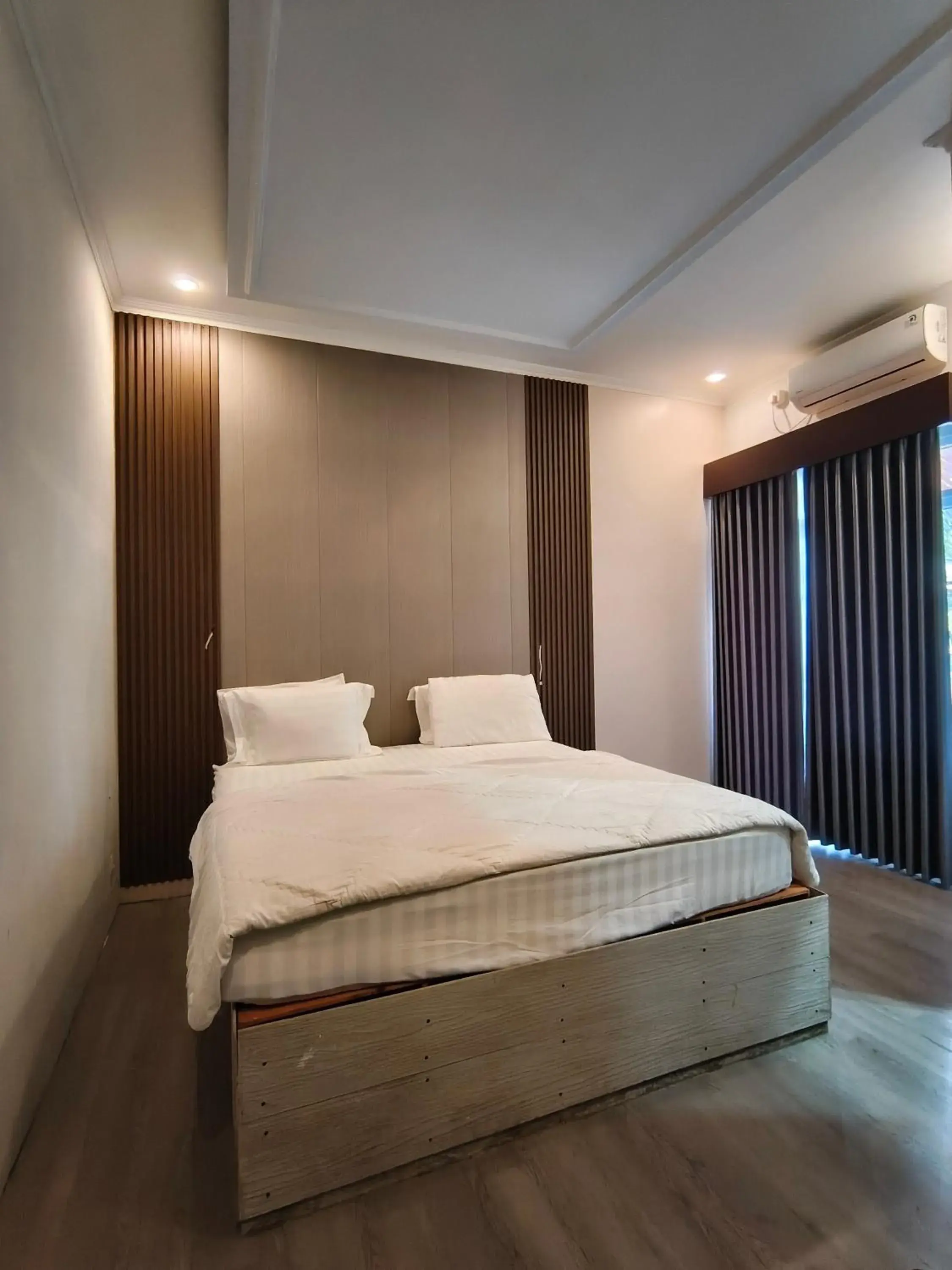 Bed in Bakom Inn Syariah Bed in Bakom Inn Syariah