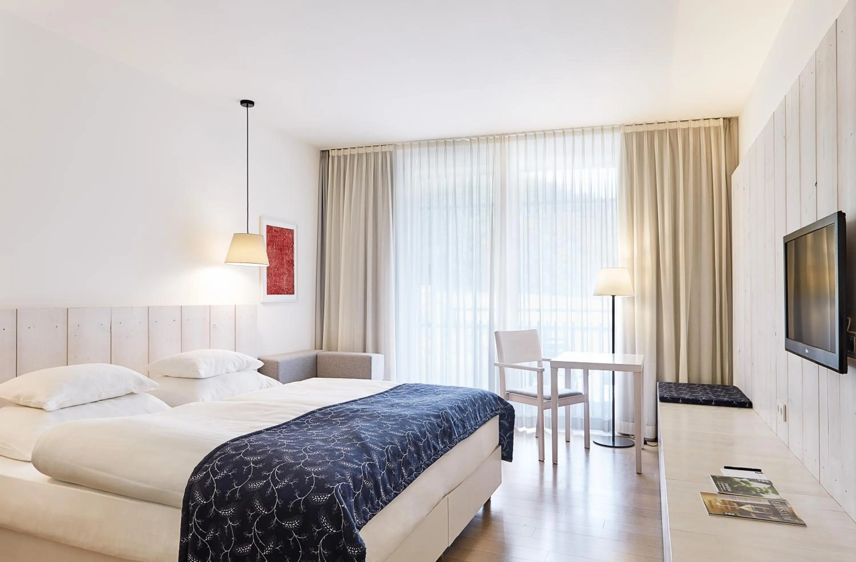 Photo of the whole room, Bed in LOISIUM Wine & Spa Hotel Südsteiermark