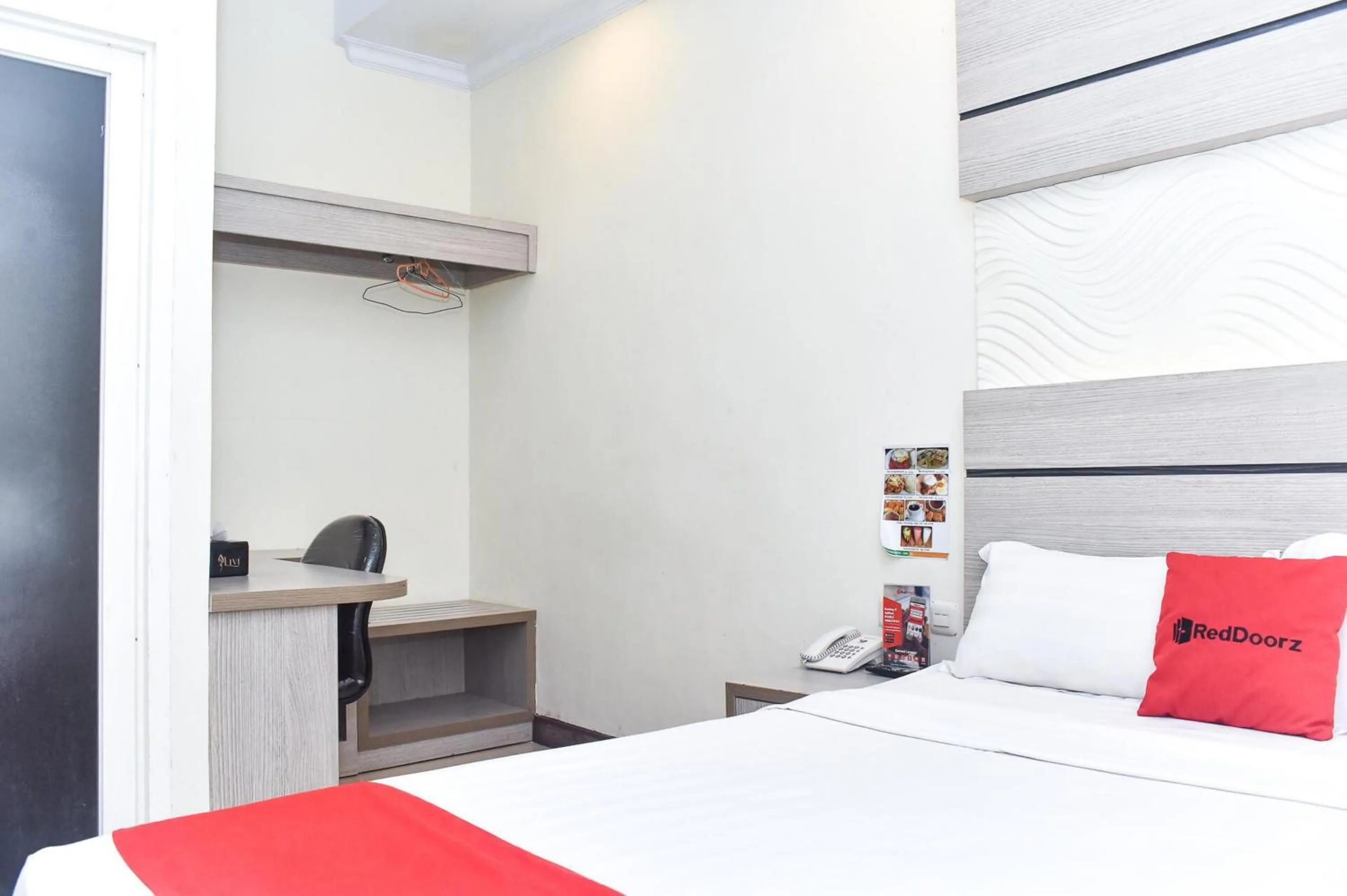 Bedroom, Bed in Reddoorz Plus near Makassar Town Square