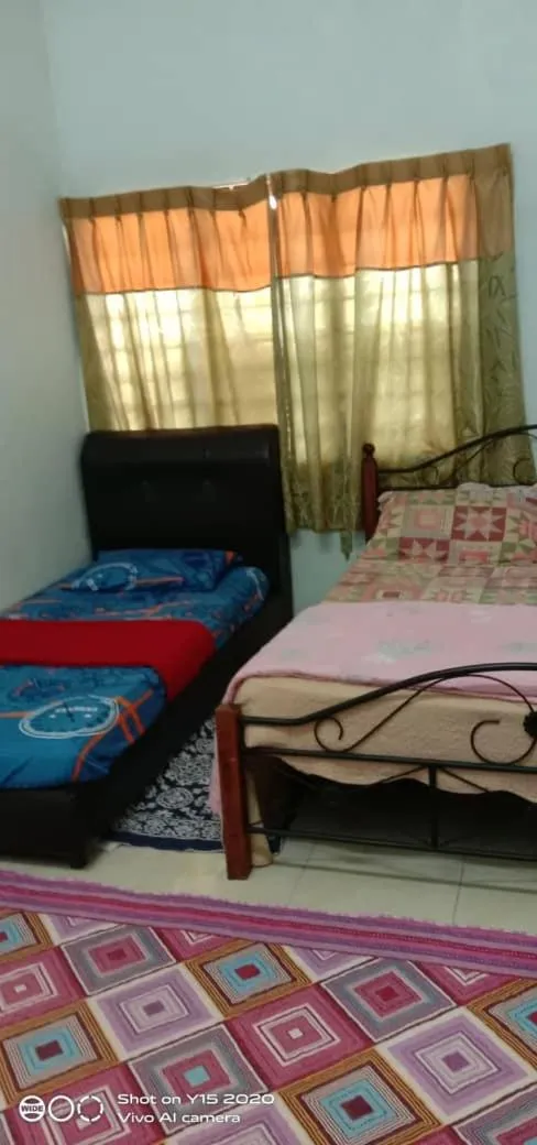 Bed in Homestay Zulaika Kota Aur