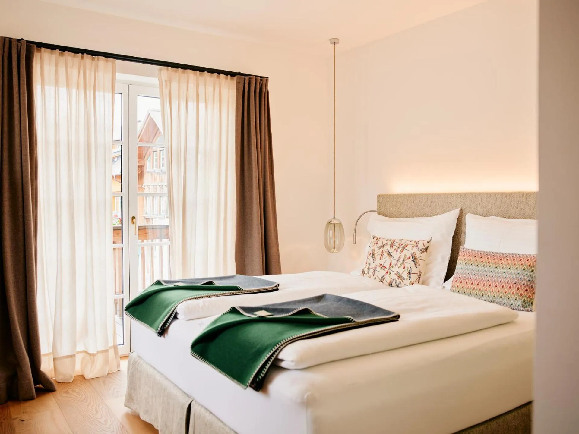 Bed in TAUROA Seehotel Grundlsee