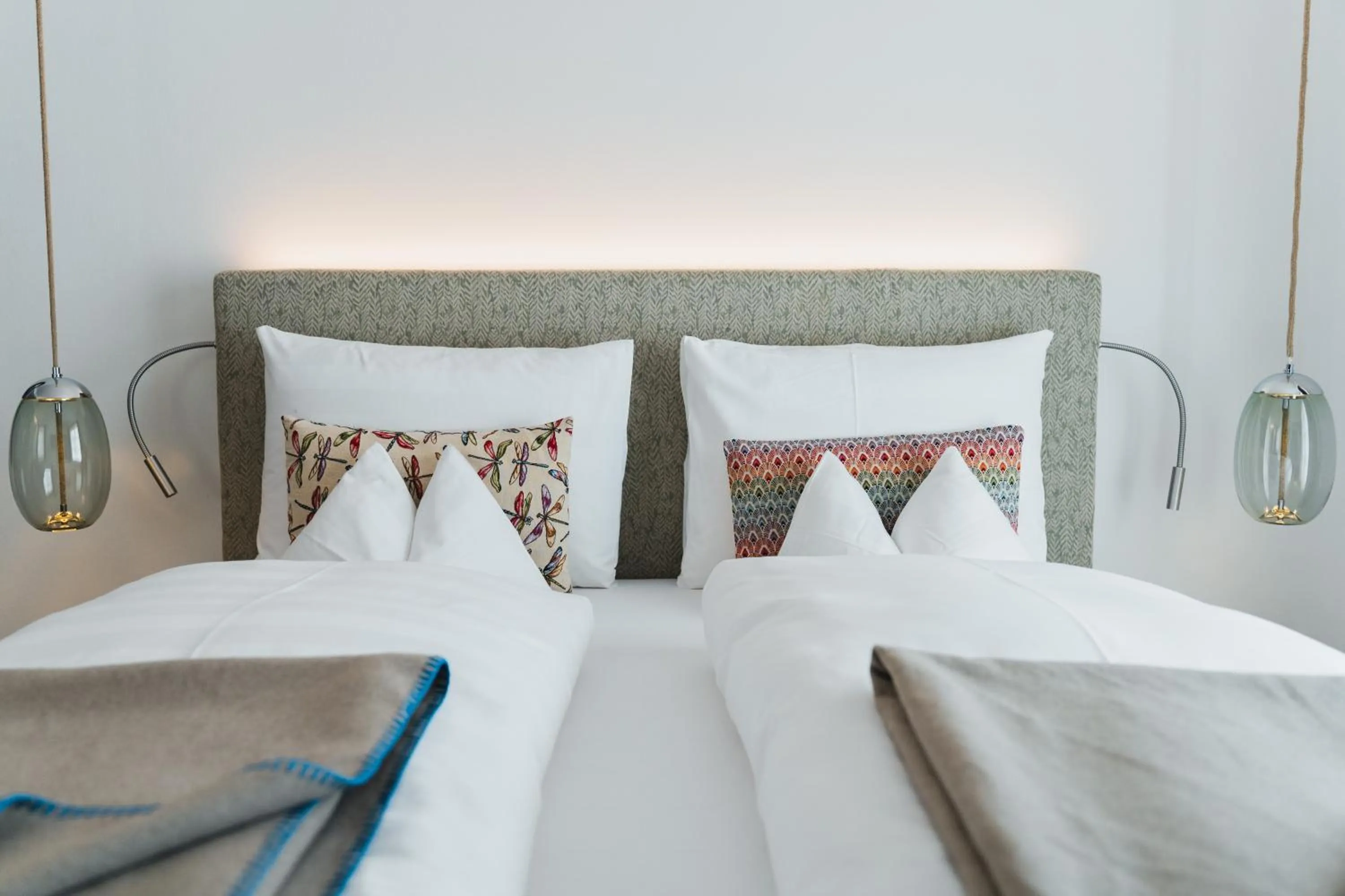 Bed in TAUROA Seehotel Grundlsee