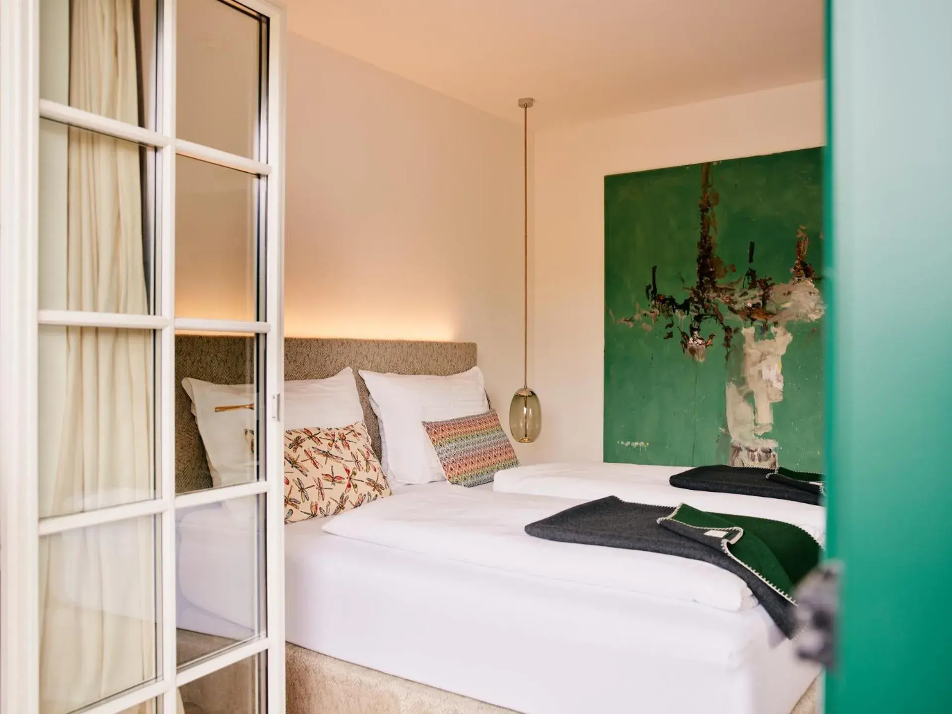 Bed in TAUROA Seehotel Grundlsee Bed in TAUROA Seehotel Grundlsee