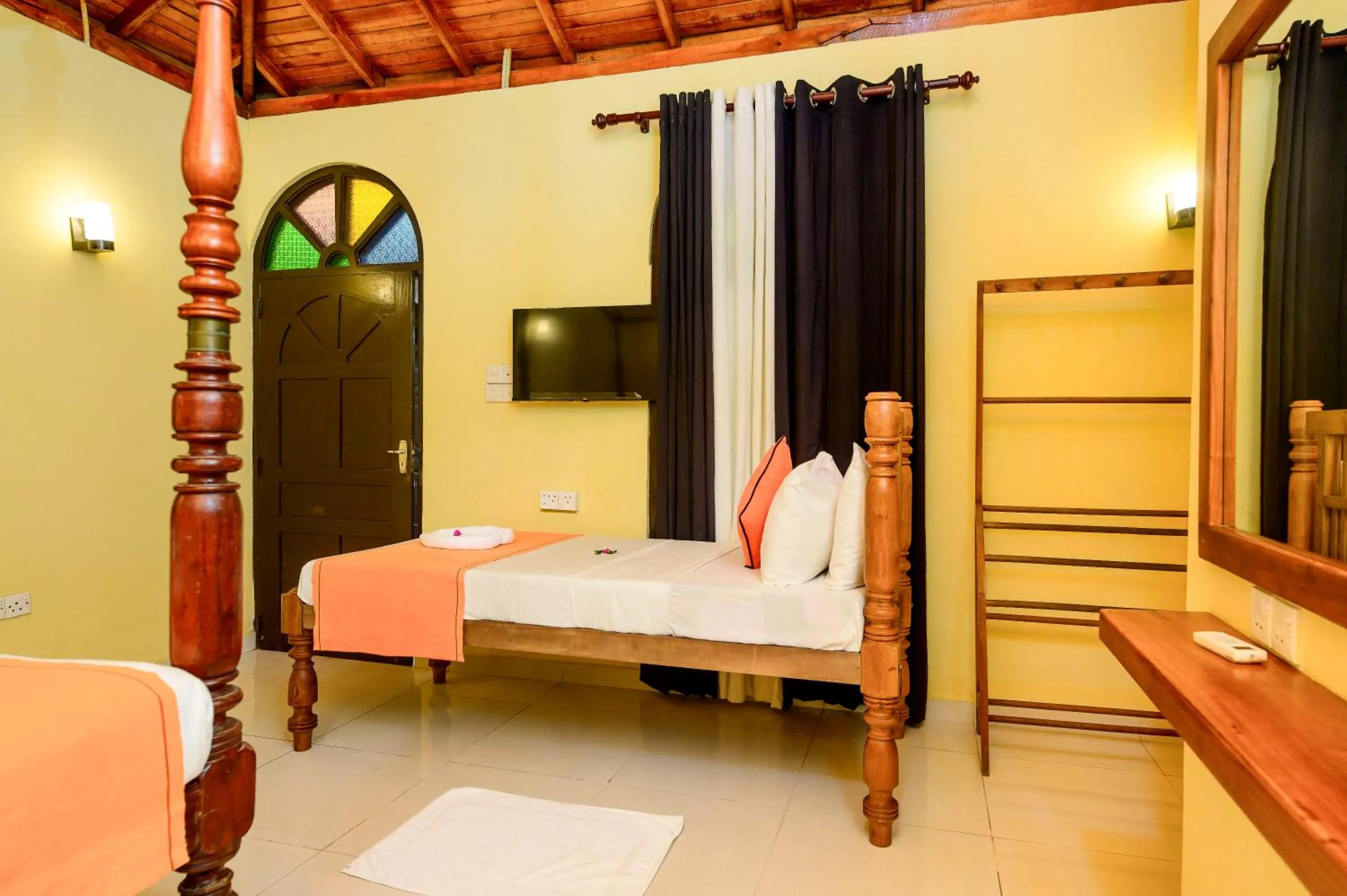 Bed in Royal Beach Hotel Hikkaduwa