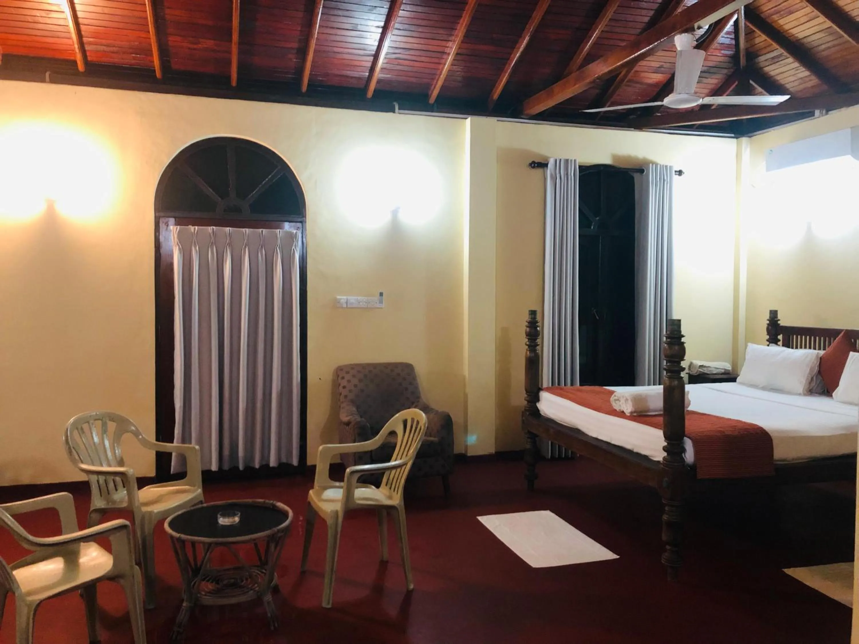 Living room, Bed in Royal Beach Hotel Hikkaduwa