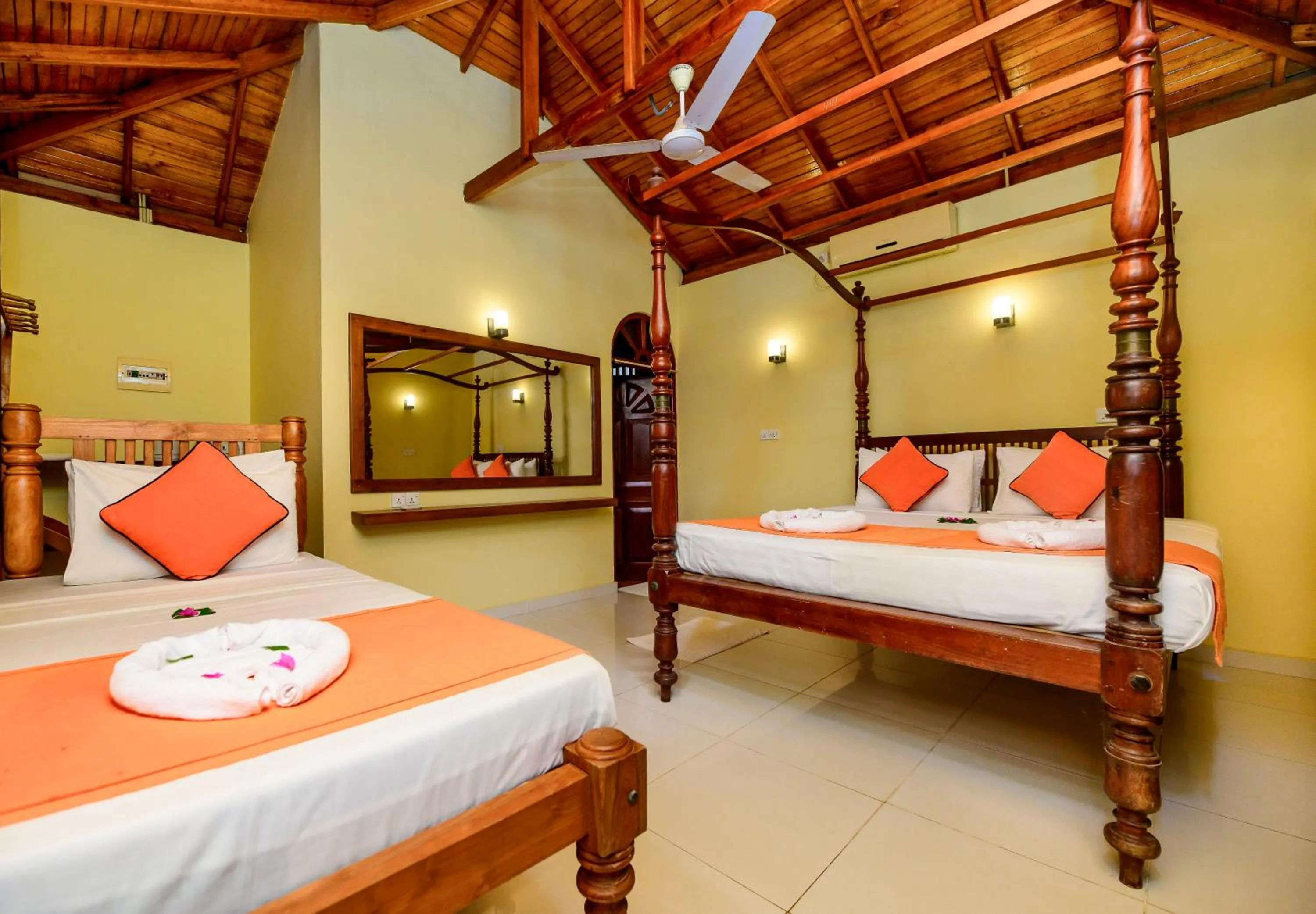 Bed in Royal Beach Hotel Hikkaduwa