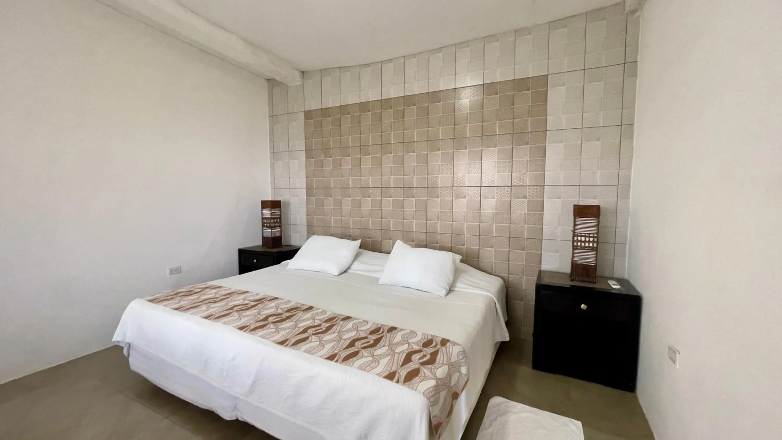 Bed in Samai Lodge Holistic Living