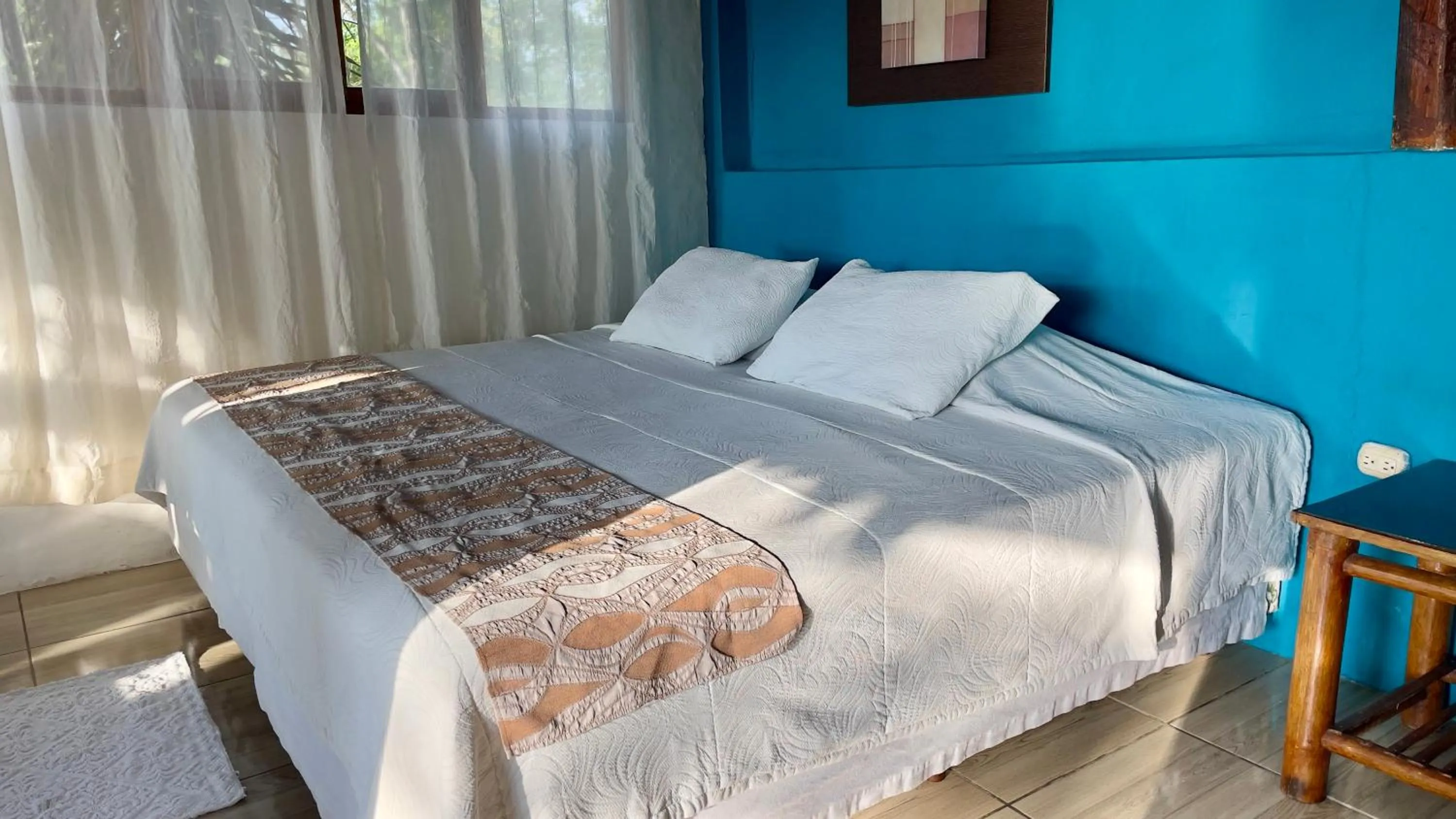 Bed in Samai Lodge Holistic Living