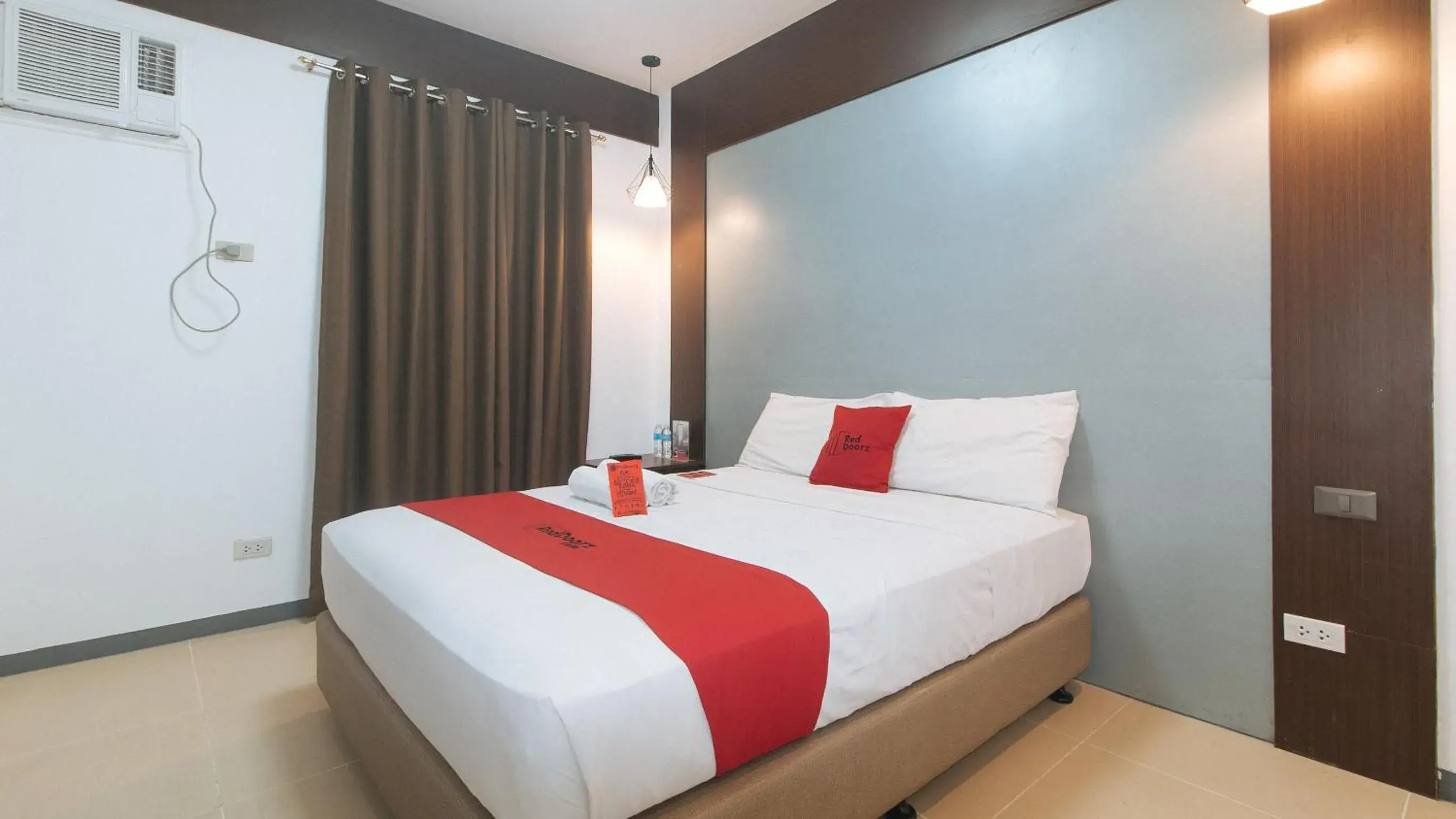 Bed in RedDoorz Plus at EDSA Congressional Bed in RedDoorz Plus at EDSA Congressional