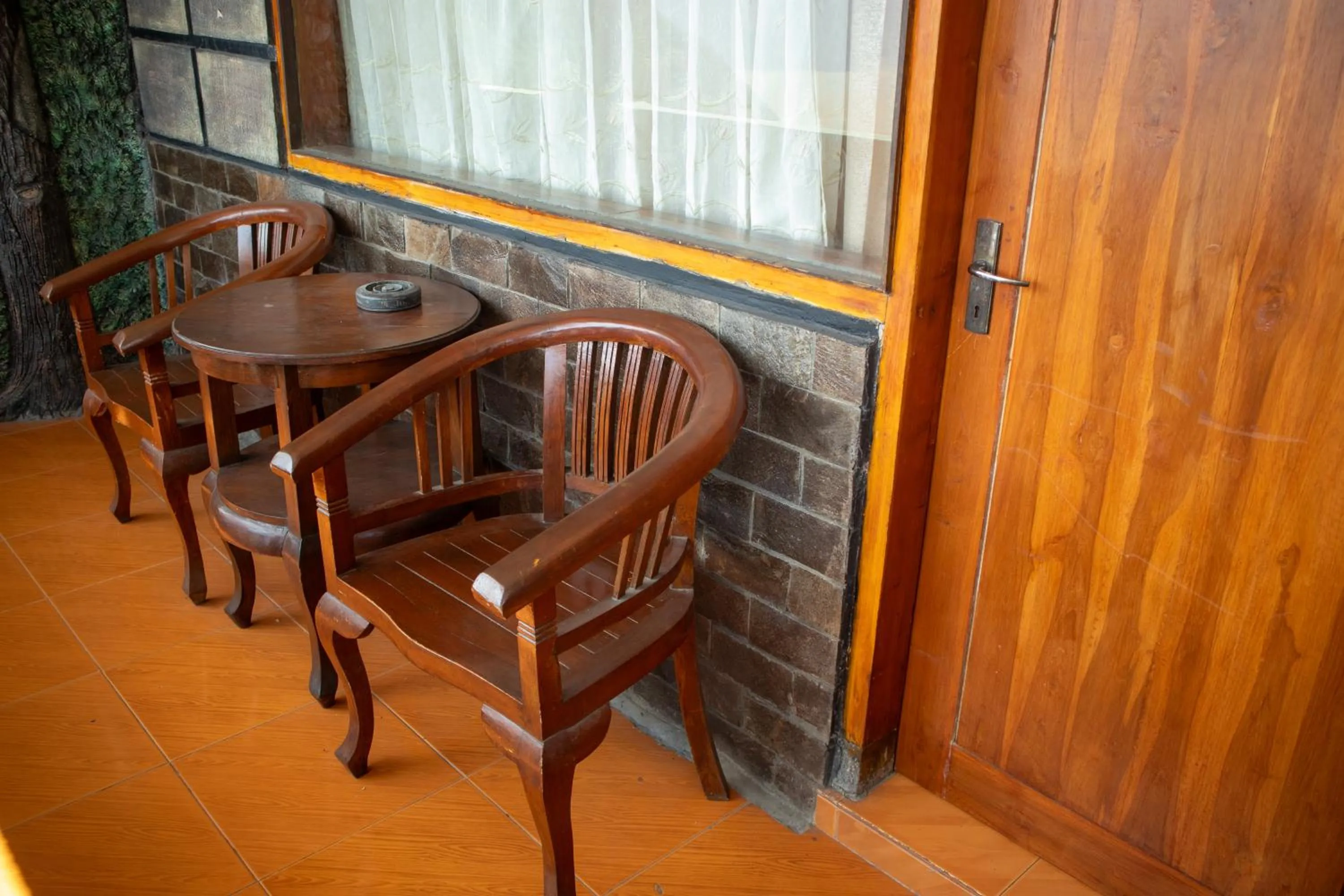 Seating area in Cemara Indah Hotel