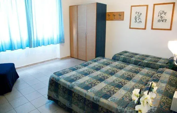 Triple Room in Albergo Rossella Triple Room in Albergo Rossella