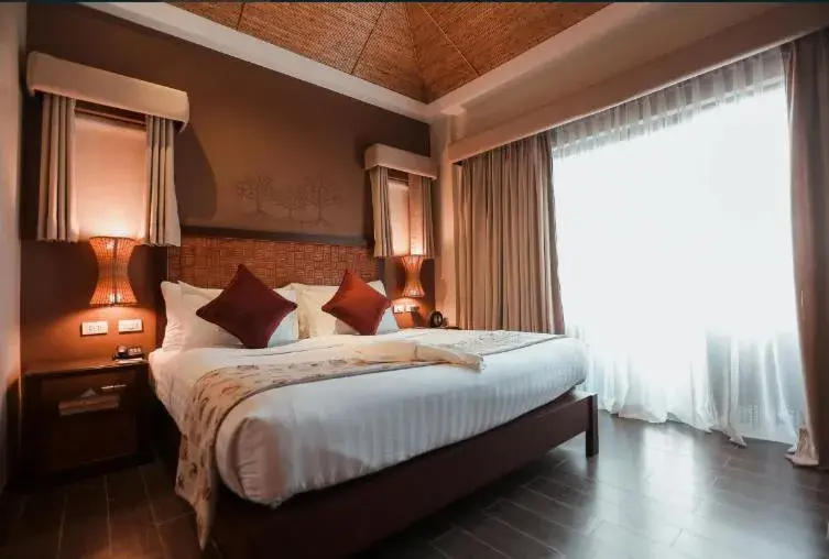 Bed in Bacau Bay Resort Coron Bed in Bacau Bay Resort Coron