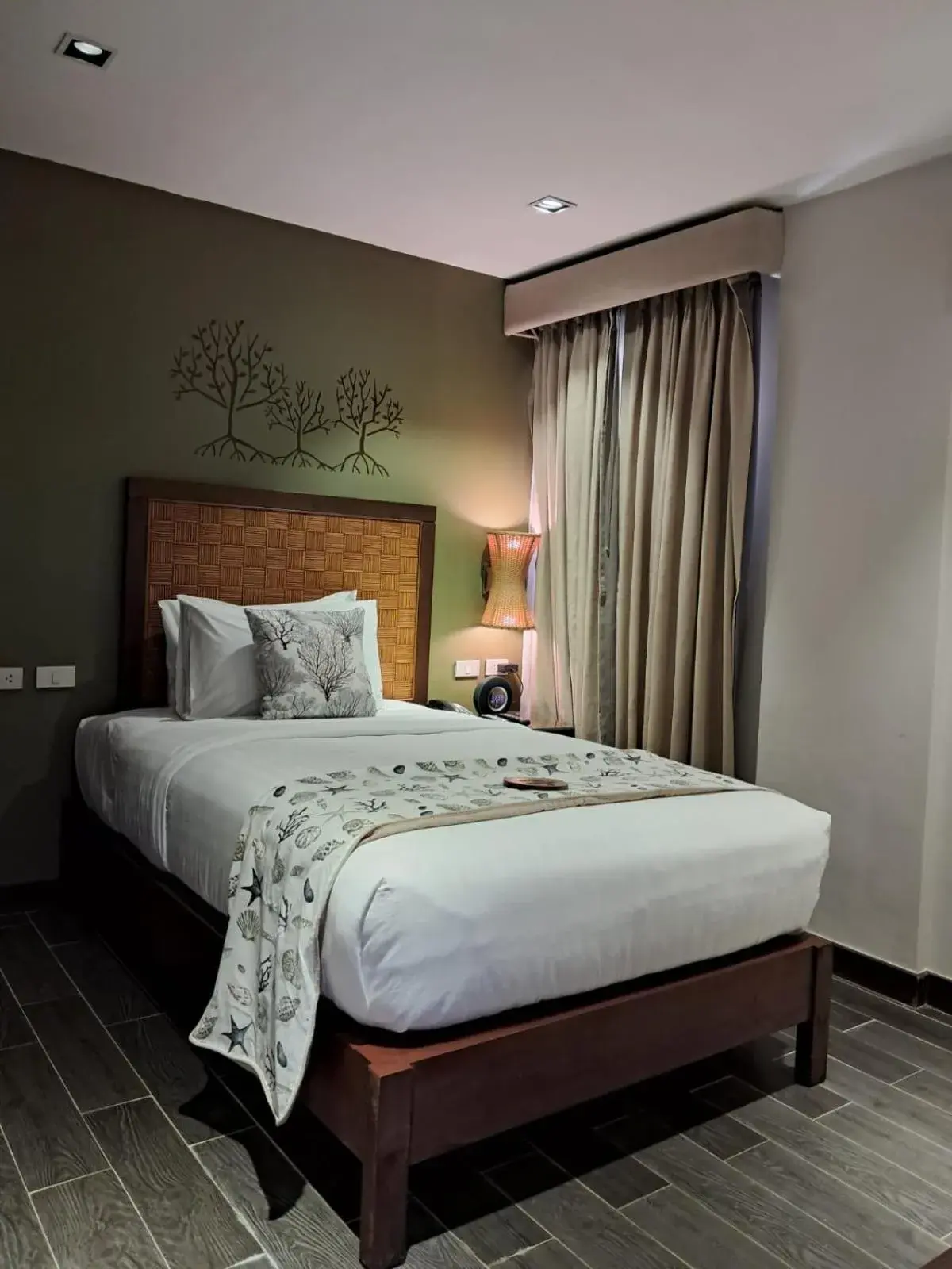 Bed in Bacau Bay Resort Coron Bed in Bacau Bay Resort Coron