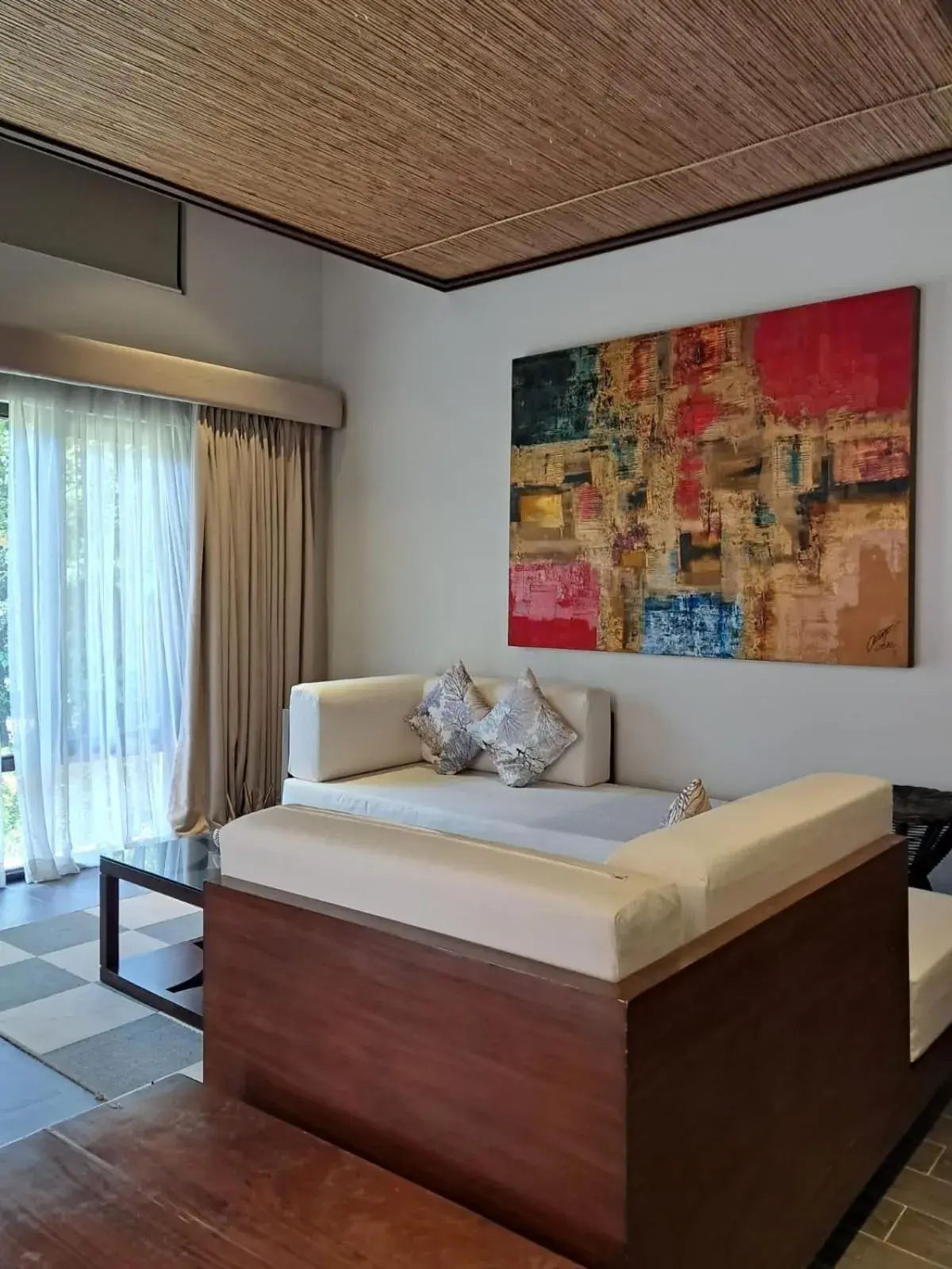 Seating area, Bed in Bacau Bay Resort Coron Seating area, Bed in Bacau Bay Resort Coron